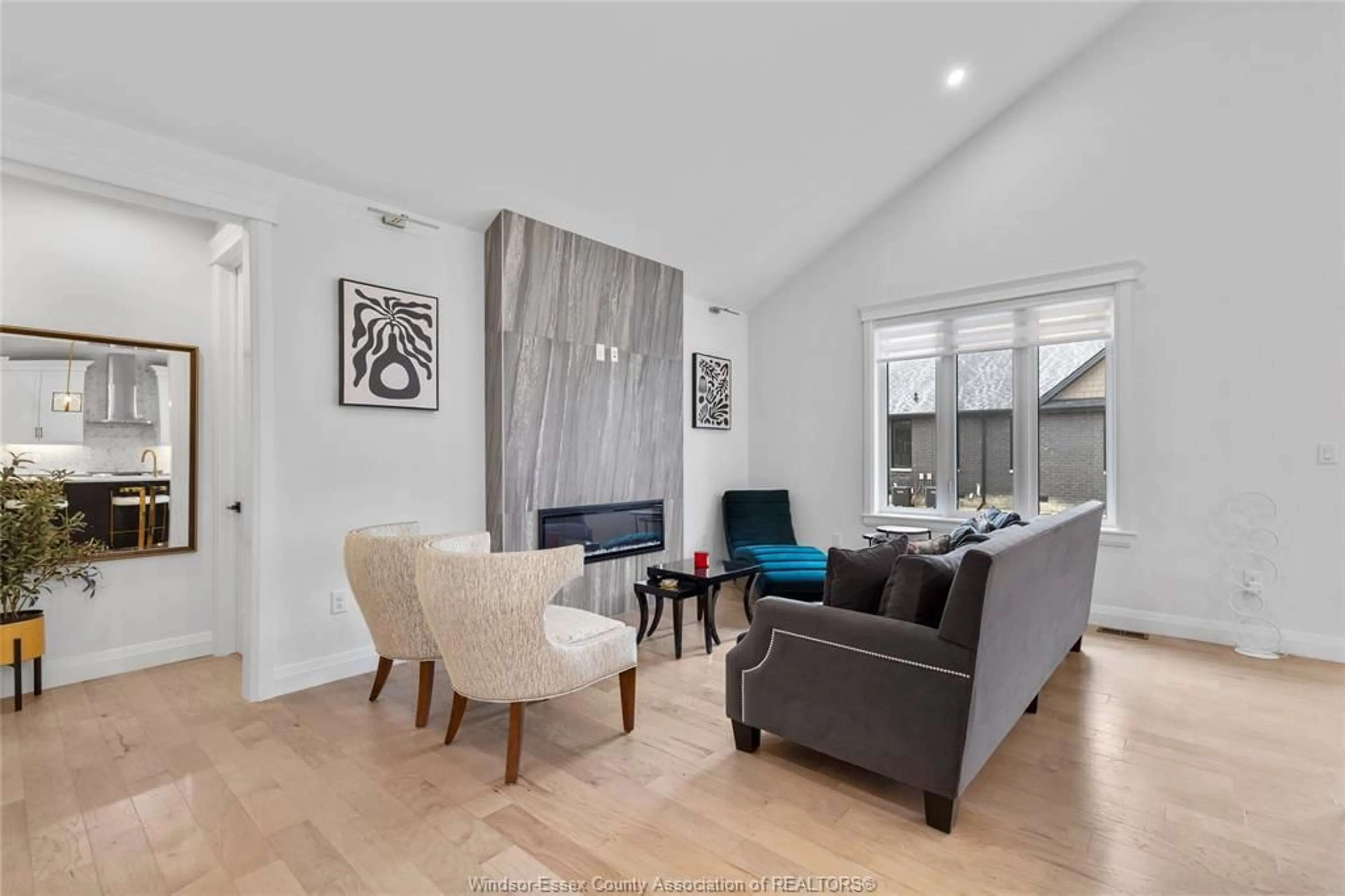 Living room with furniture, wood/laminate floor for 395 CASERTA, Lakeshore Ontario N0R 1A0