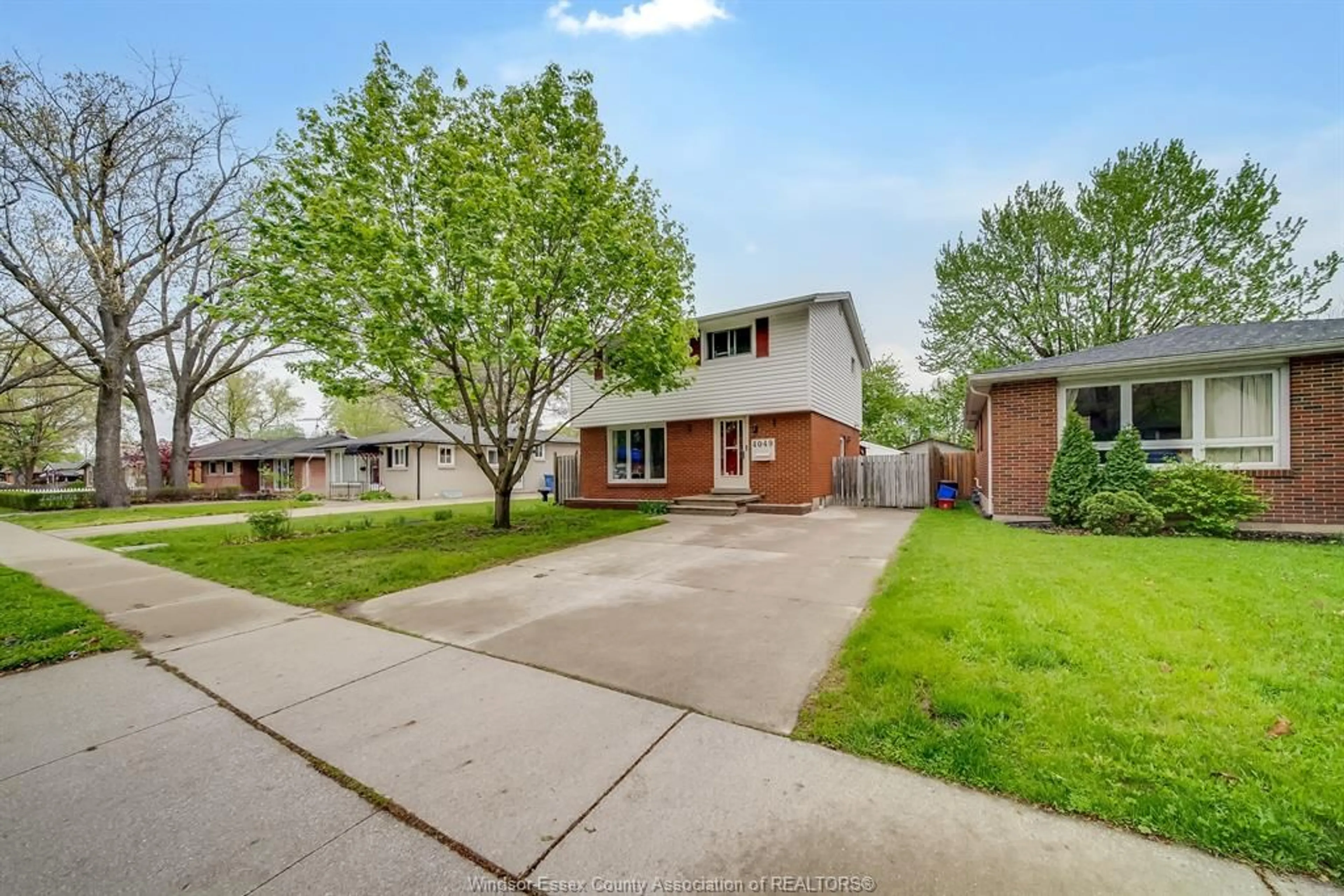 Home with brick exterior material, street for 4049 WHITNEY Ave, Windsor Ontario N9C 2C7