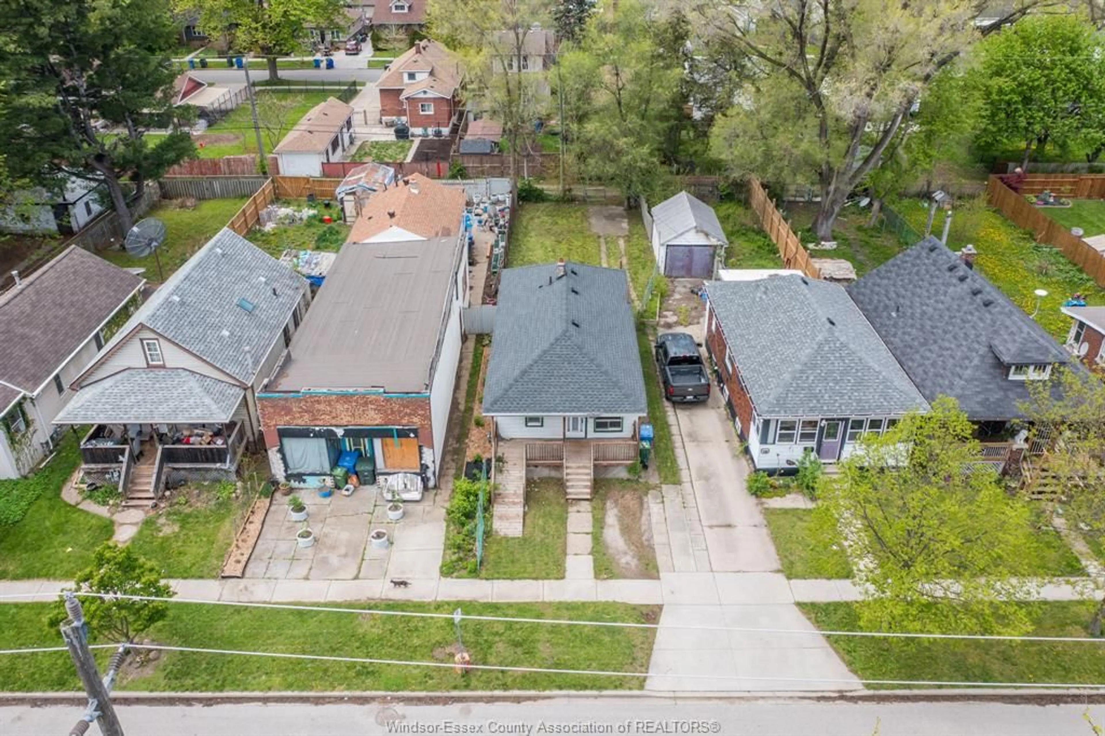 A pic from outside/outdoor area/front of a property/back of a property/a pic from drone, street for 3574 BLOOMFIELD RD., Windsor Ontario N9C 1R7