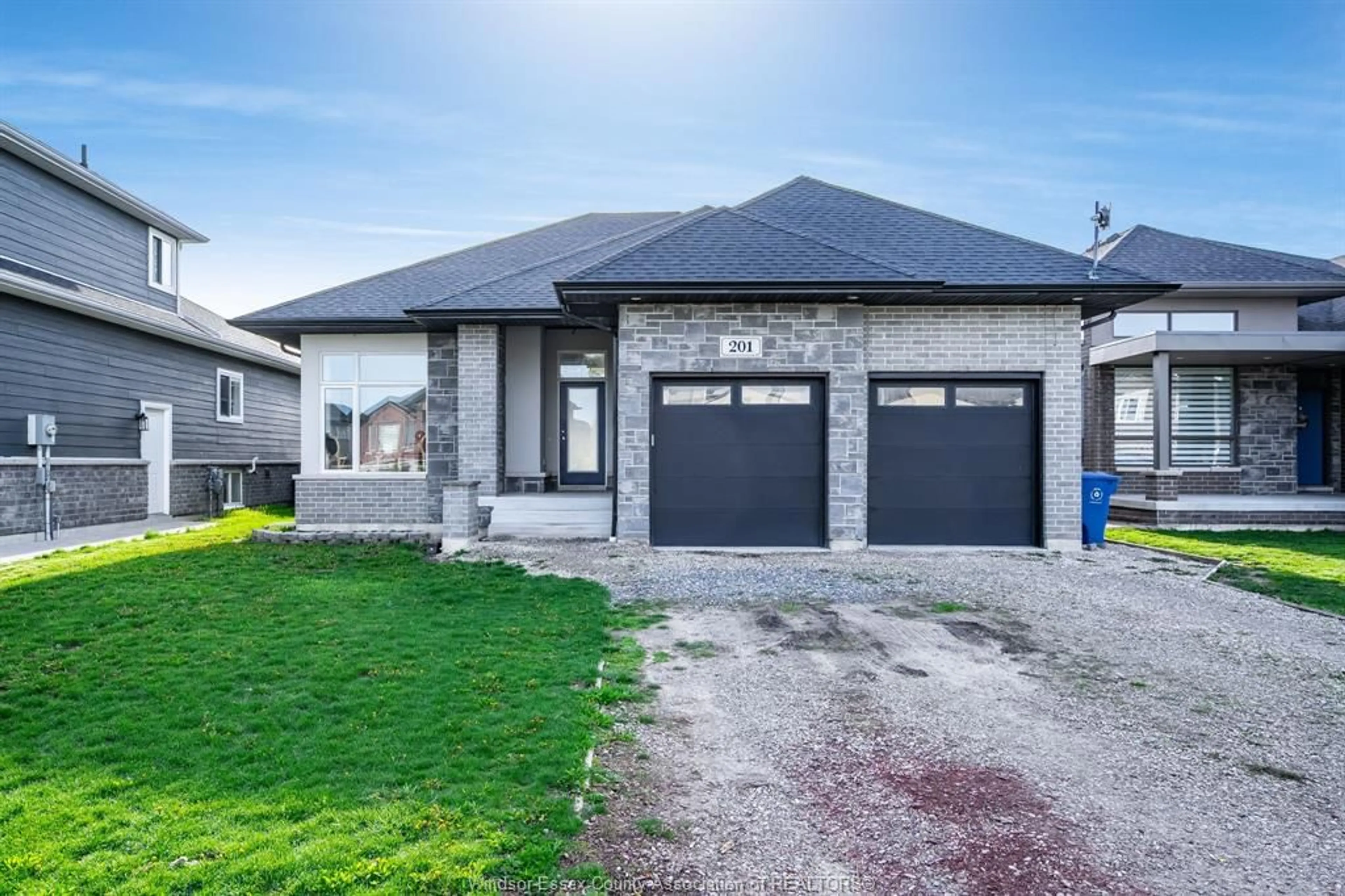 Home with brick exterior material, street for 201 Spring St, Belle River Ontario N8L 0G7