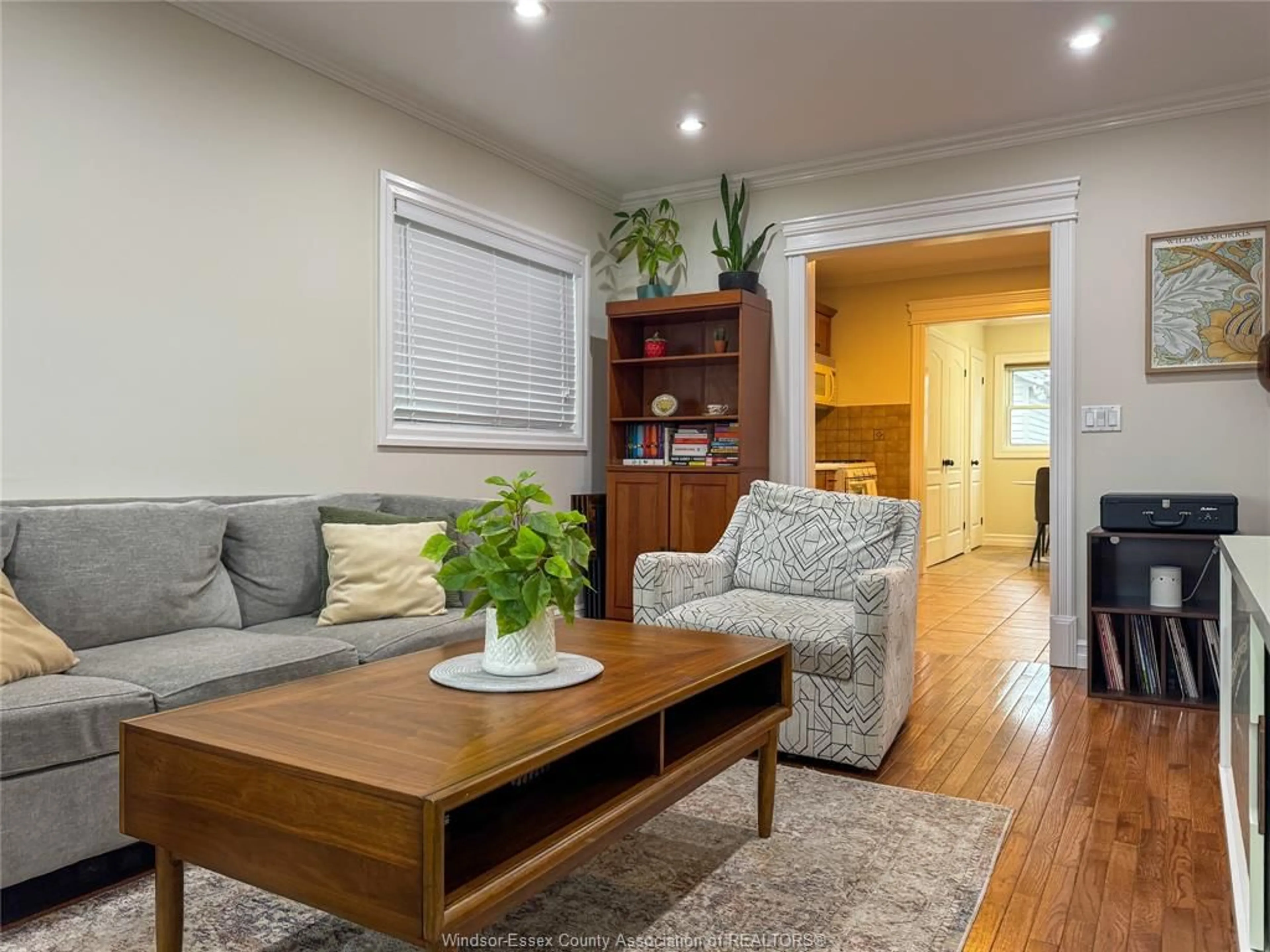 Living room with furniture, wood/laminate floor for 2579 LLOYD GEORGE BLVD, Windsor Ontario N8T 2T3