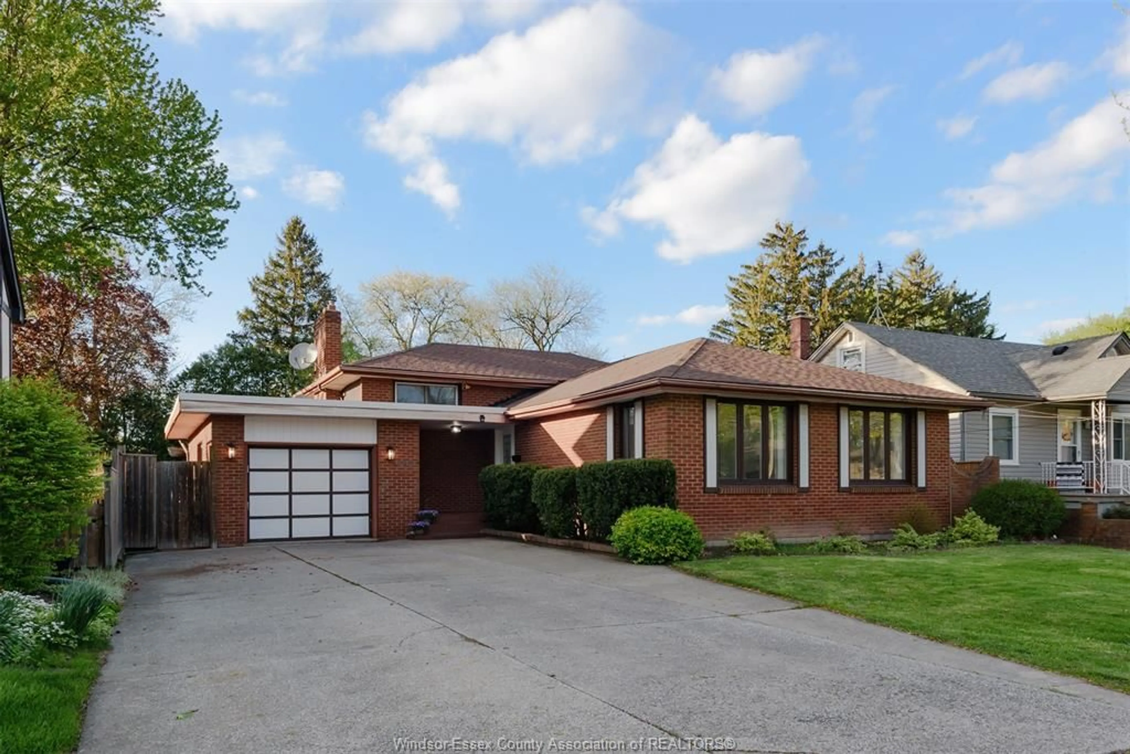 Home with brick exterior material, street for 740 KENNEDY Dr, Windsor Ontario N9G 1S9