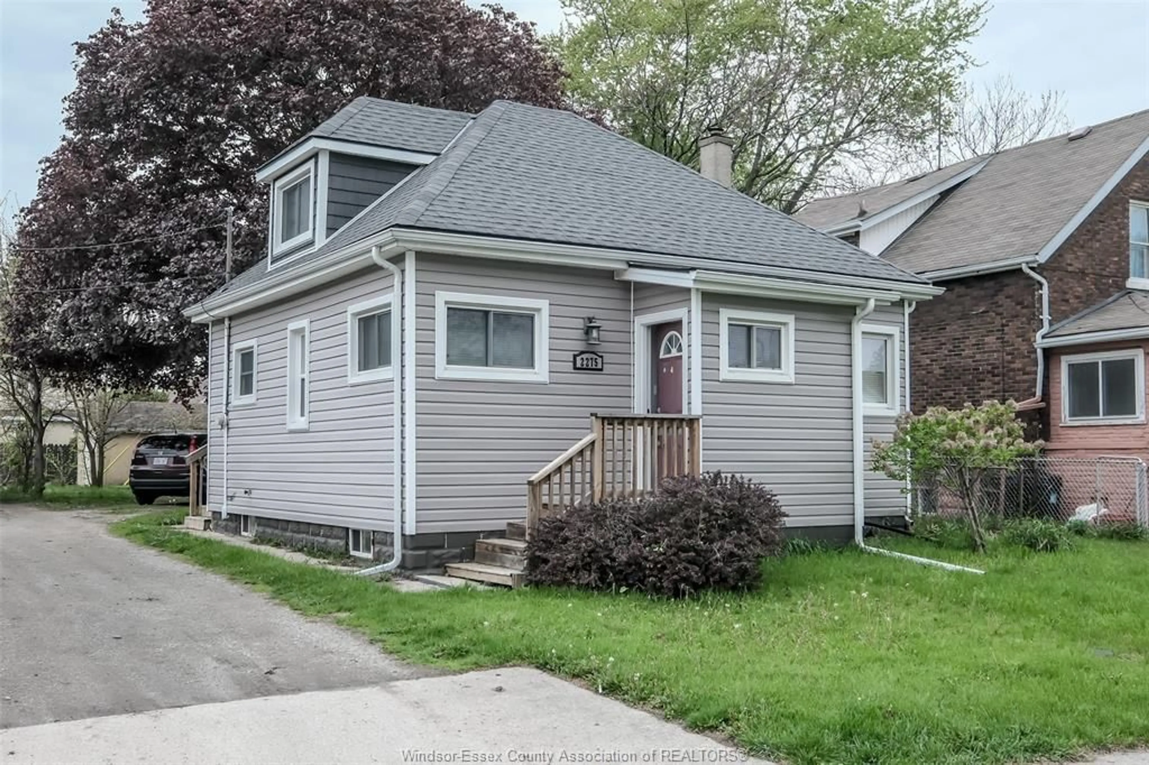 Home with vinyl exterior material, street for 2275 HIGHLAND Ave, Windsor Ontario N8X 3S3