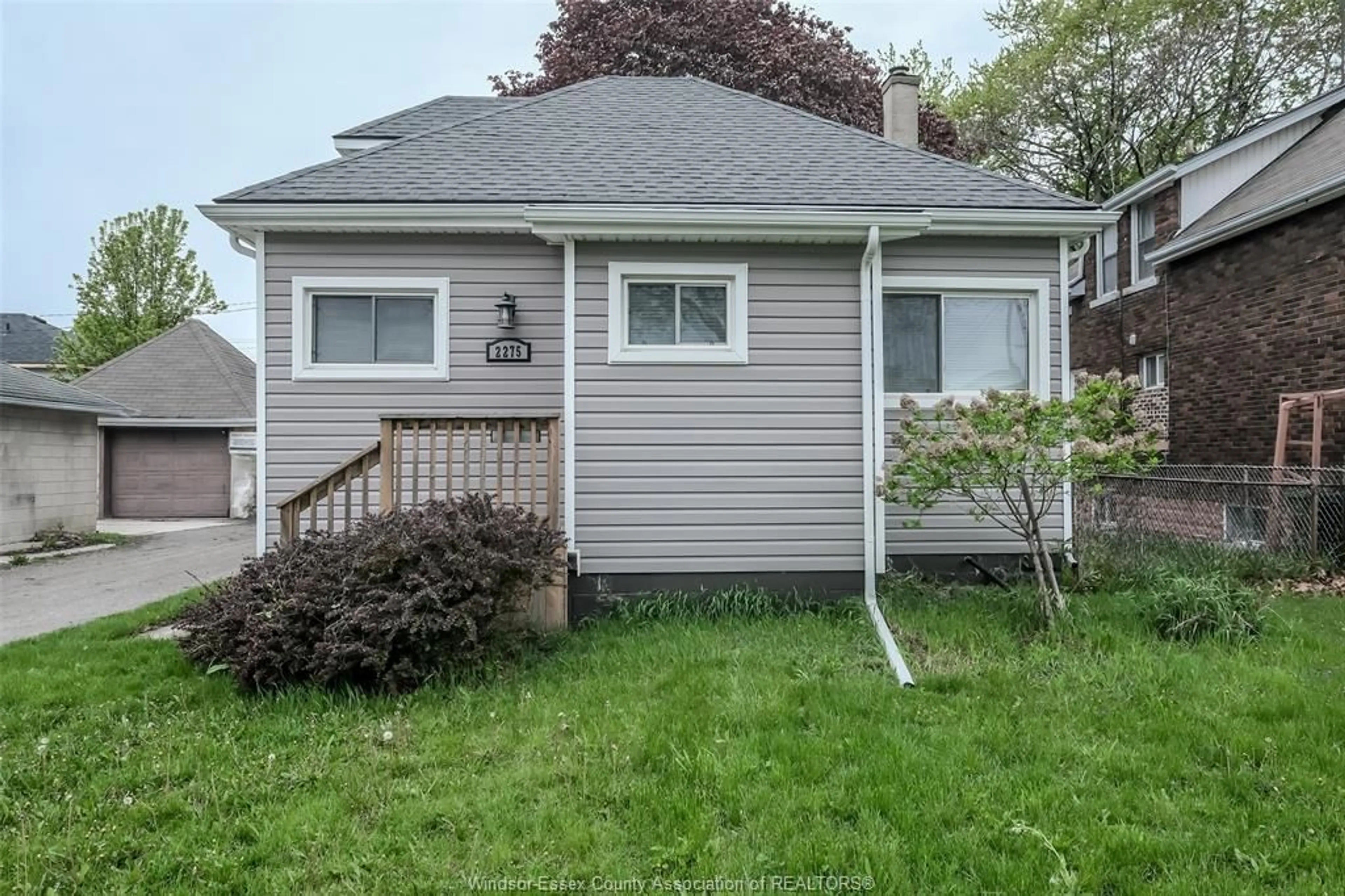Home with vinyl exterior material, street for 2275 HIGHLAND Ave, Windsor Ontario N8X 3S3