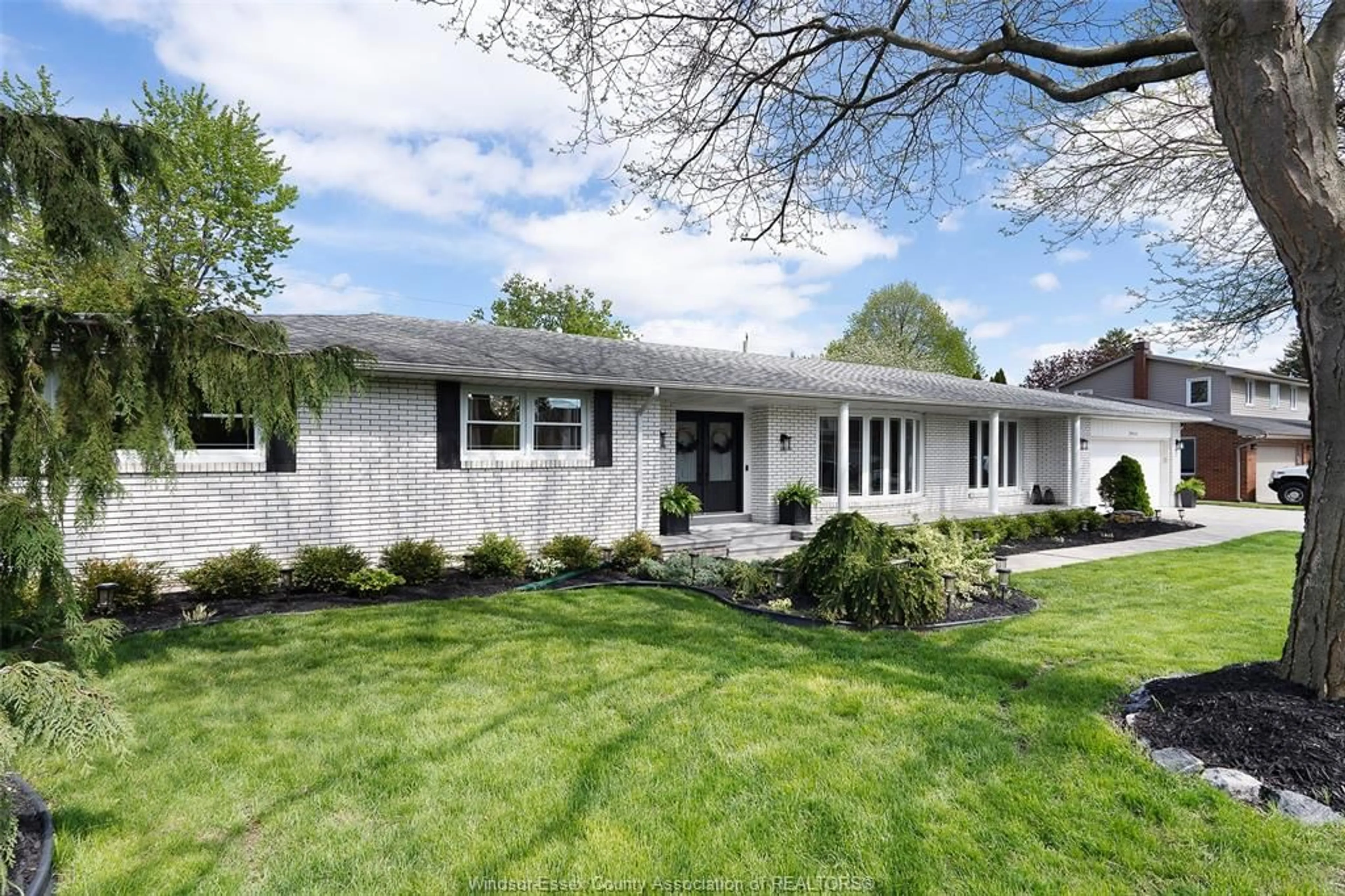 Home with vinyl exterior material, street for 2466 CURRY Ave, Windsor Ontario N9E 2S5