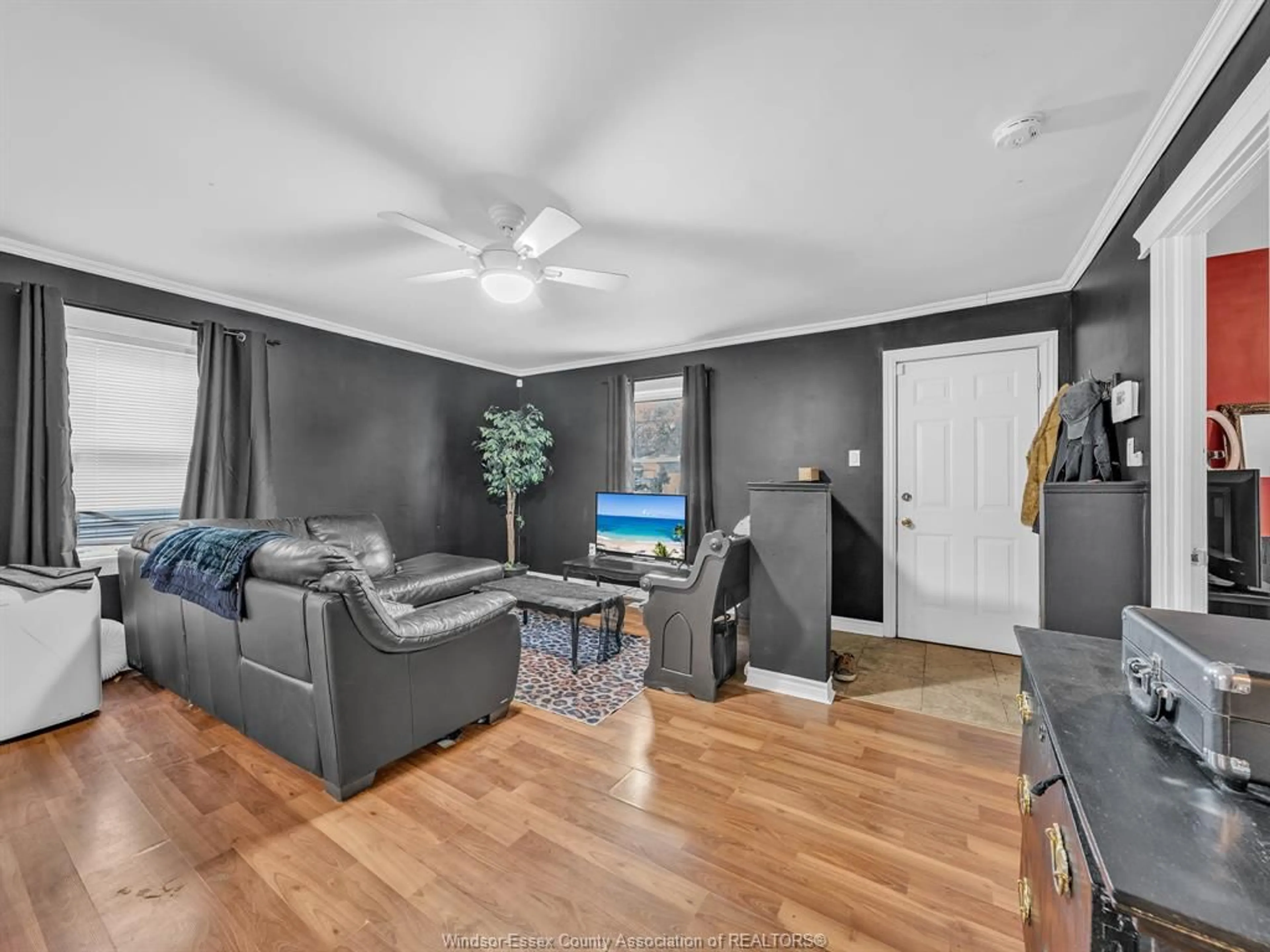 Living room with furniture, wood/laminate floor for 3422 BARRYMORE, Windsor Ontario N9C 1V1