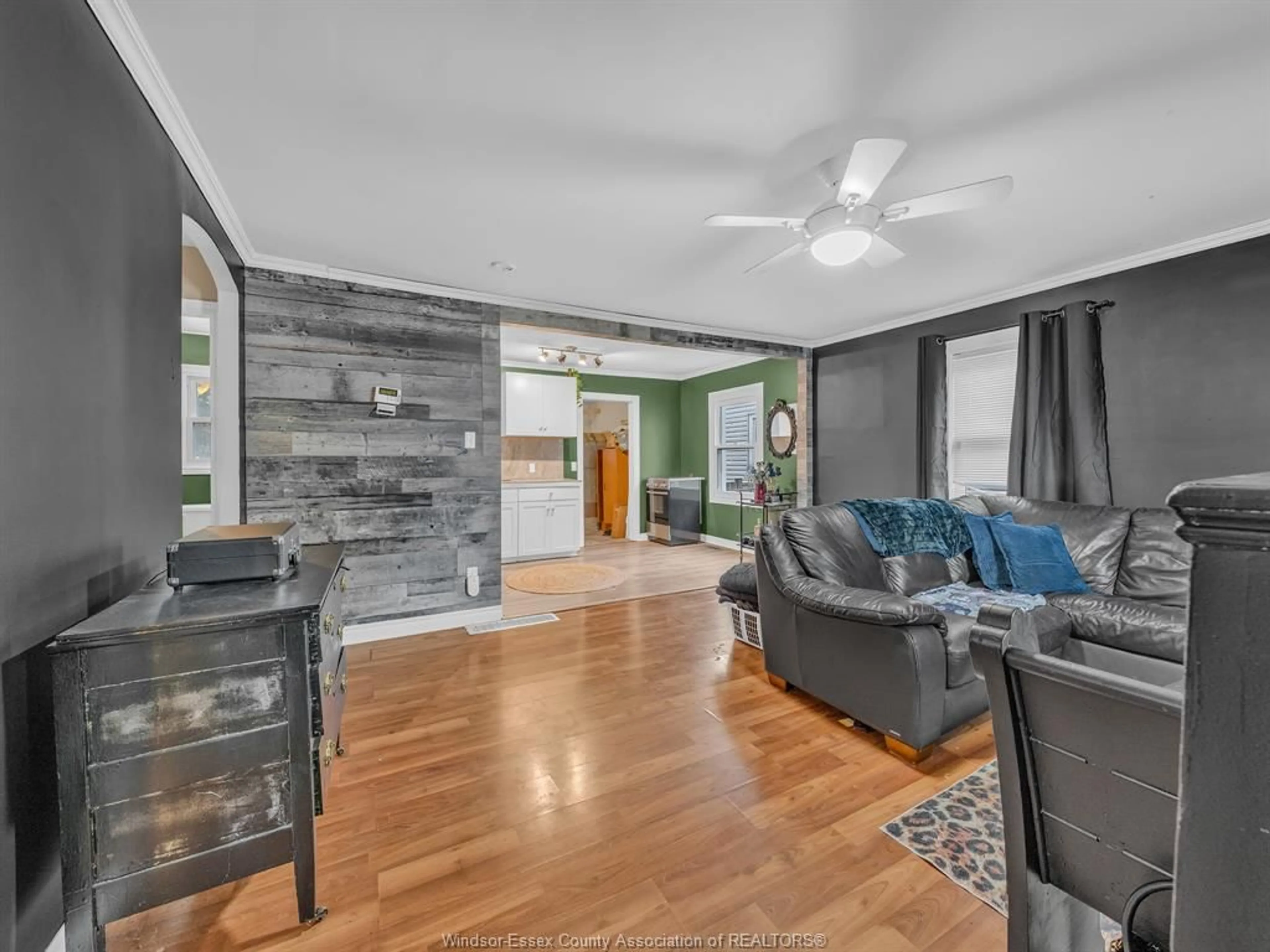 Living room with furniture, wood/laminate floor for 3422 BARRYMORE, Windsor Ontario N9C 1V1