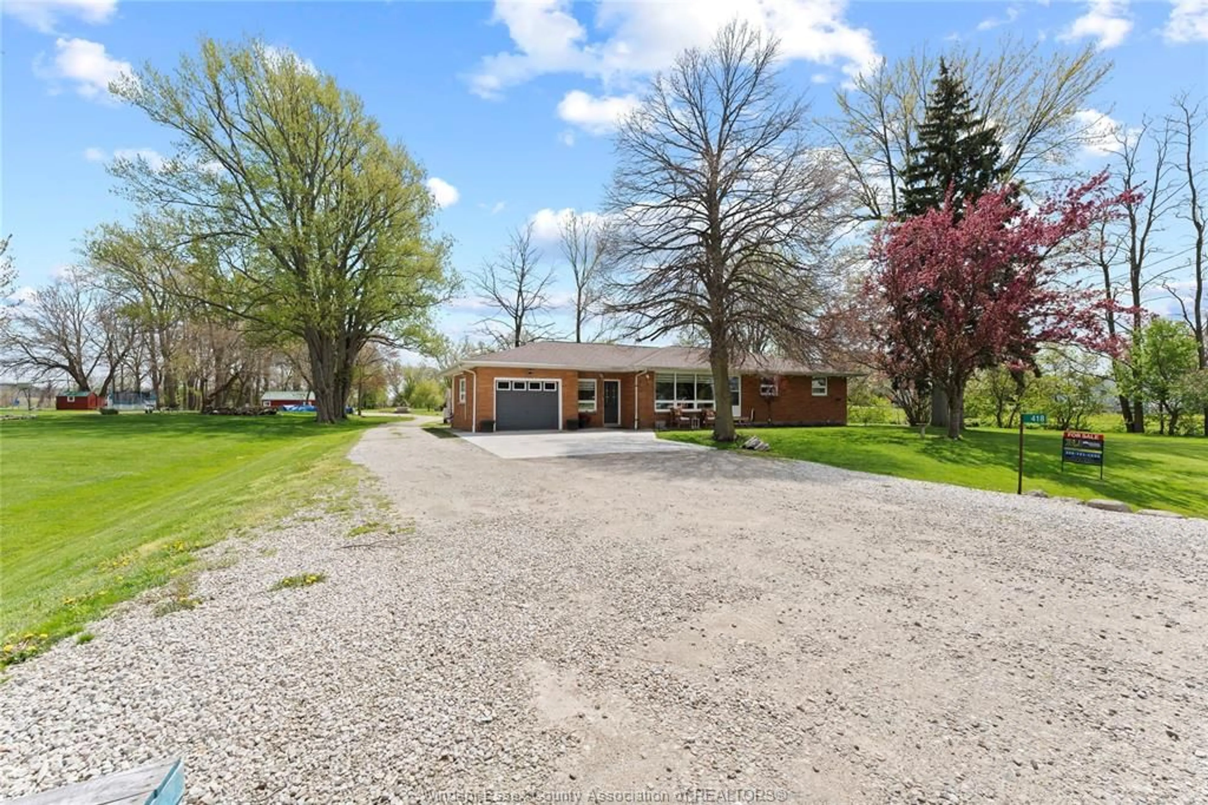 A pic from outside/outdoor area/front of a property/back of a property/a pic from drone, unknown for 418 TALBOT Rd, Leamington Ontario N8H 3V6