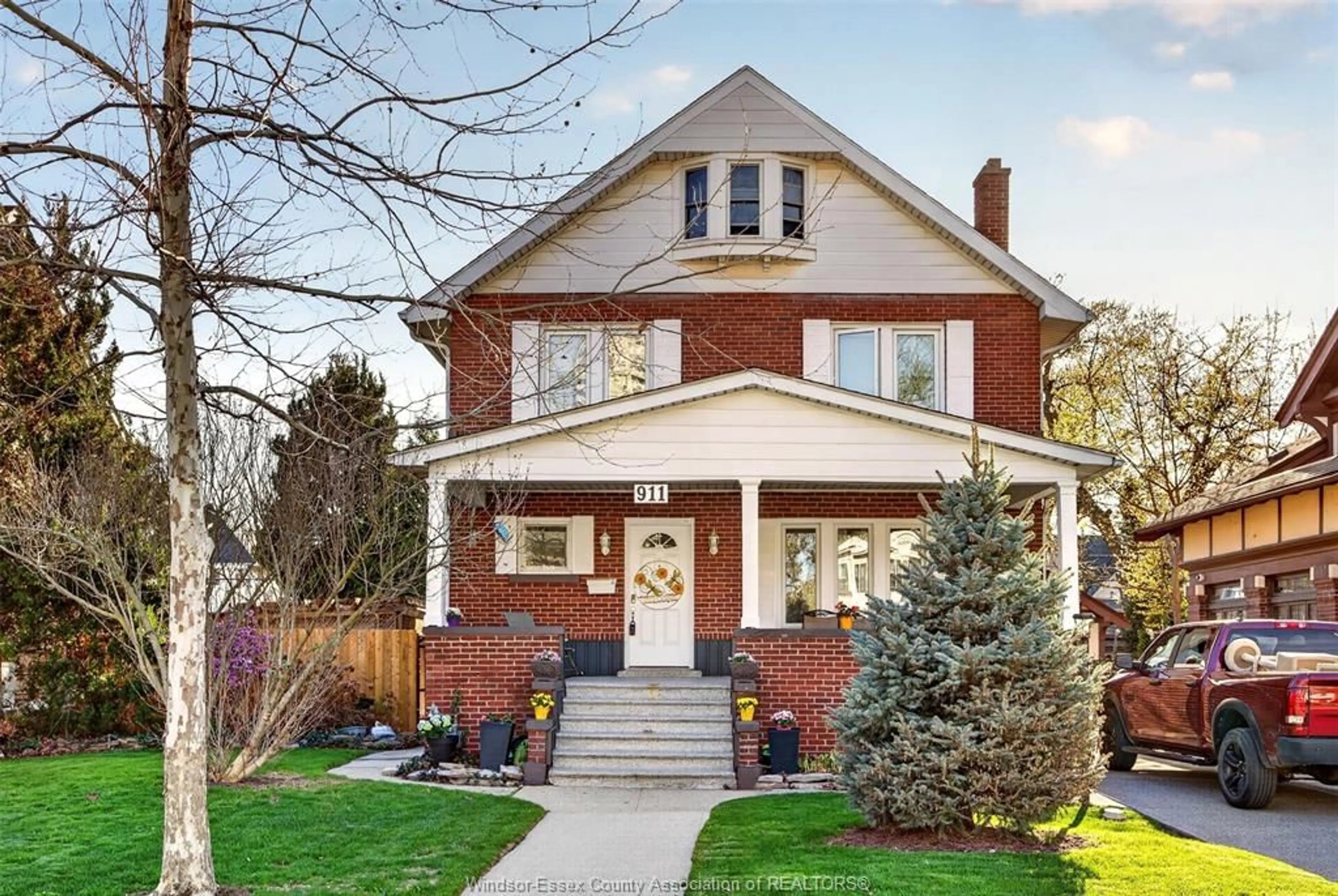 Home with brick exterior material, street for 911 Victoria Ave, Windsor Ontario N9A 4N5