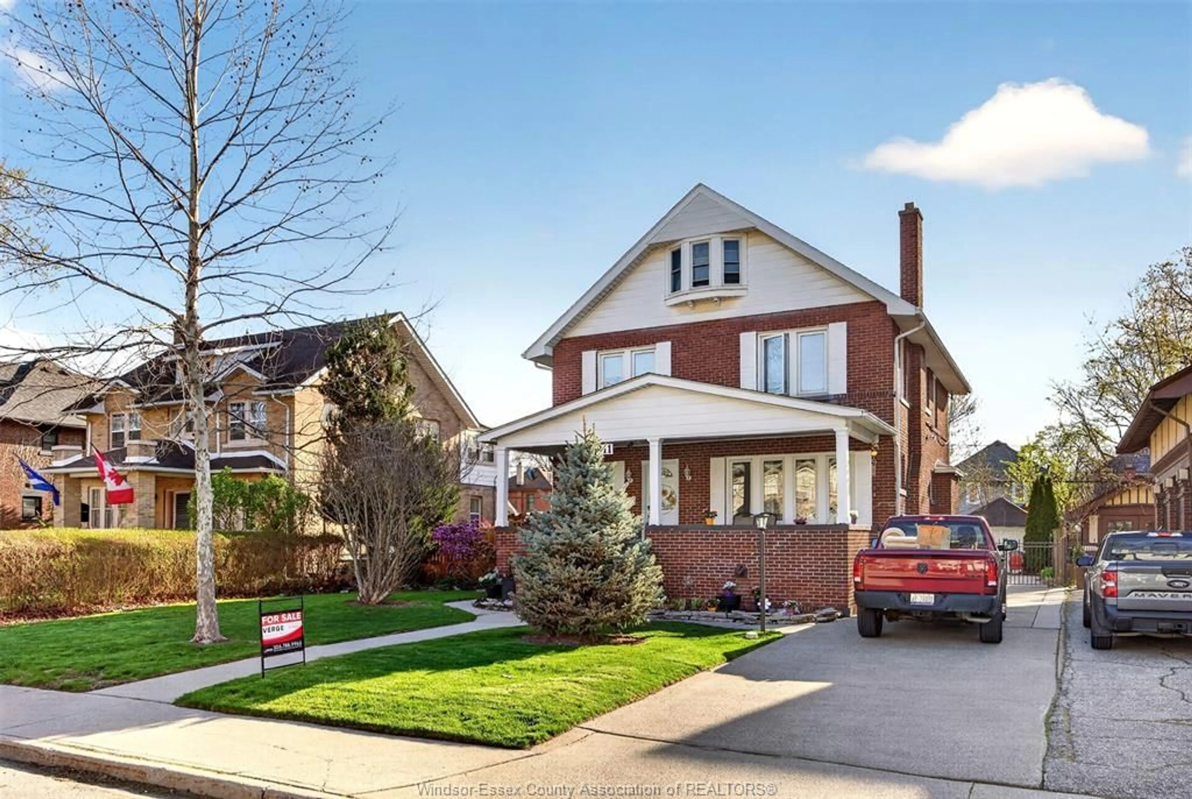 Home with brick exterior material, street for 911 Victoria Ave, Windsor Ontario N9A 4N5