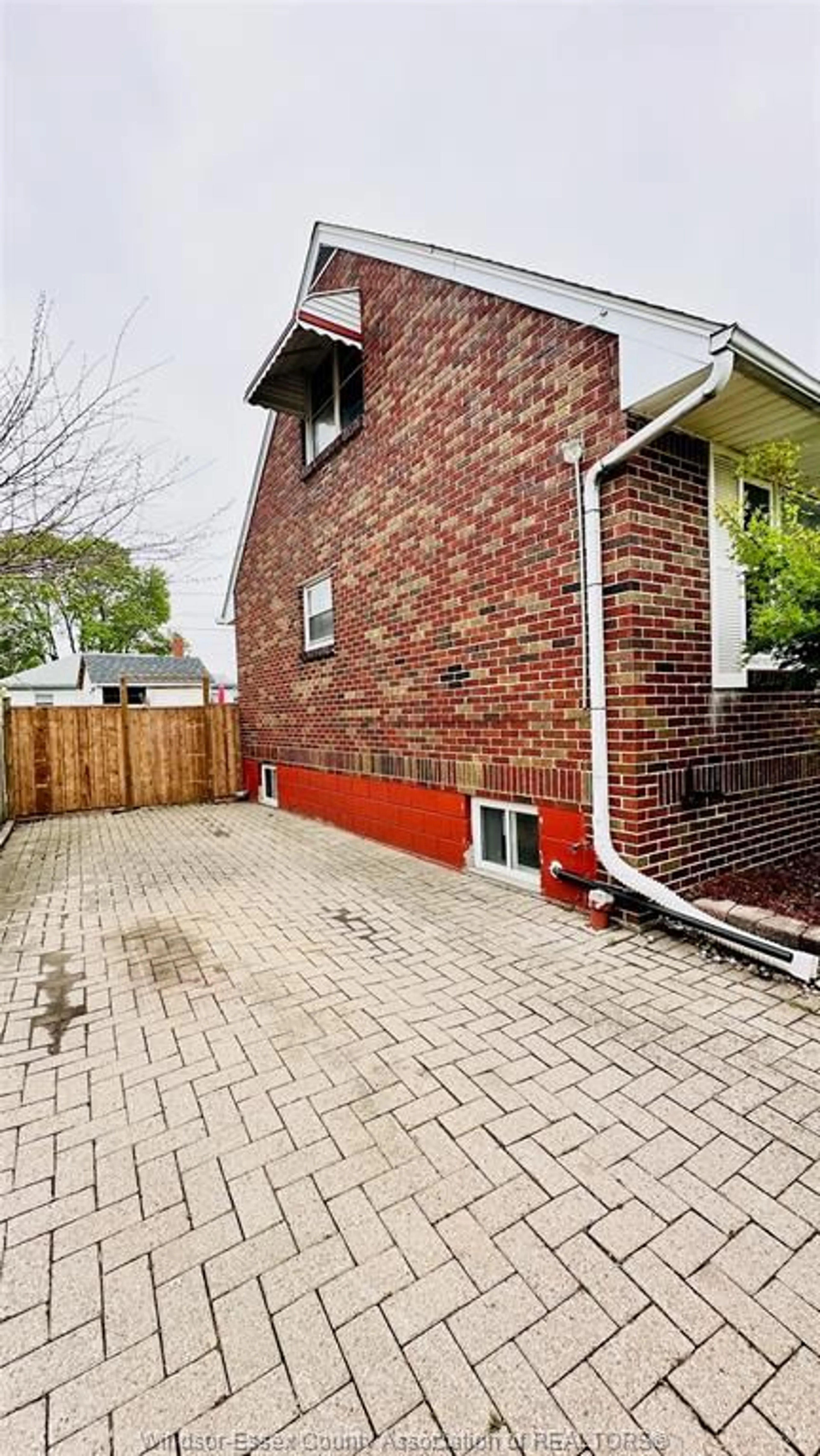 Home with brick exterior material, street for 3519 TECUMSEH Rd, Windsor Ontario N9C 2B6