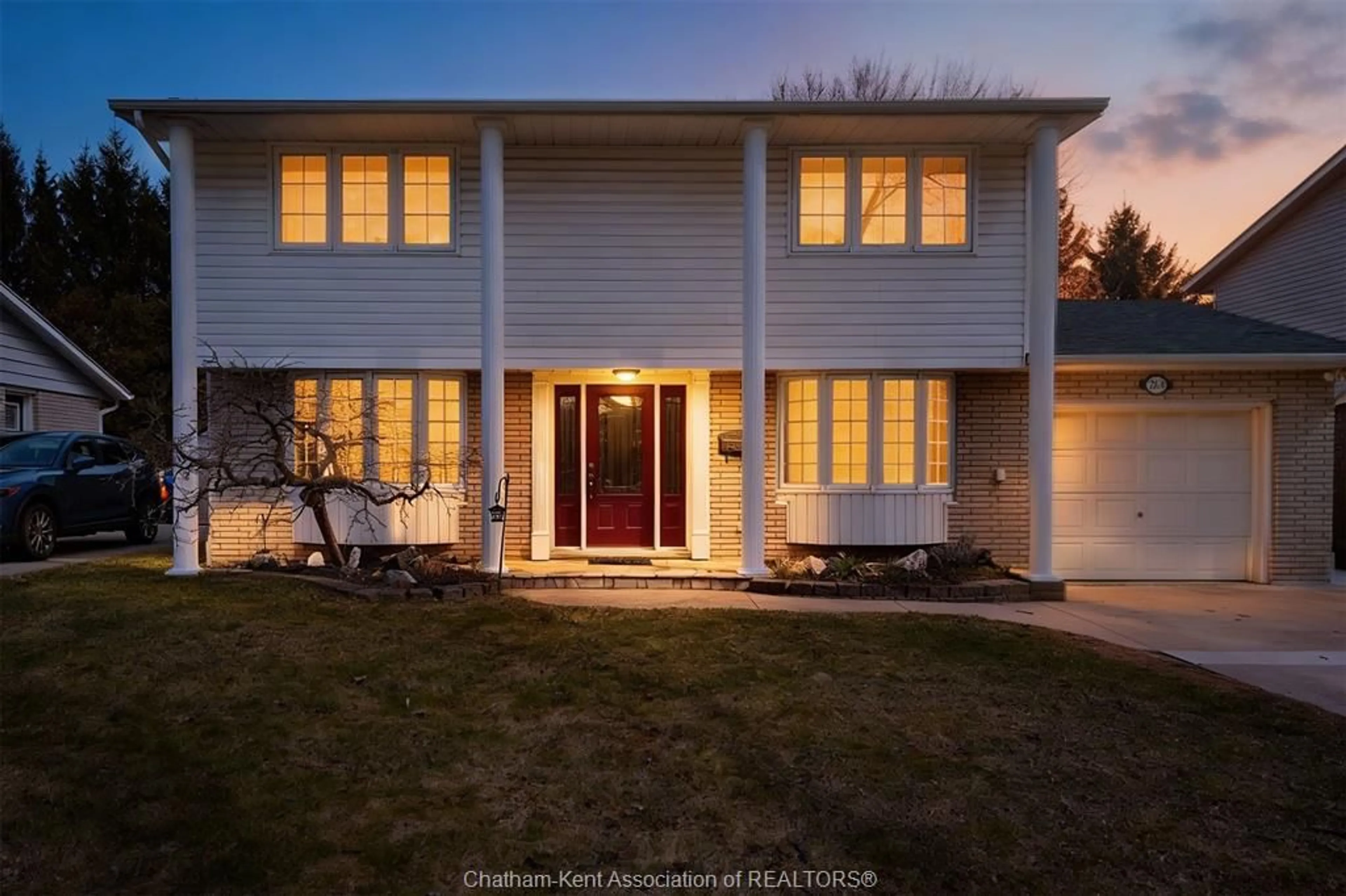 Home with vinyl exterior material, street for 264 Baldoon Rd, Chatham Ontario N7L 1E6