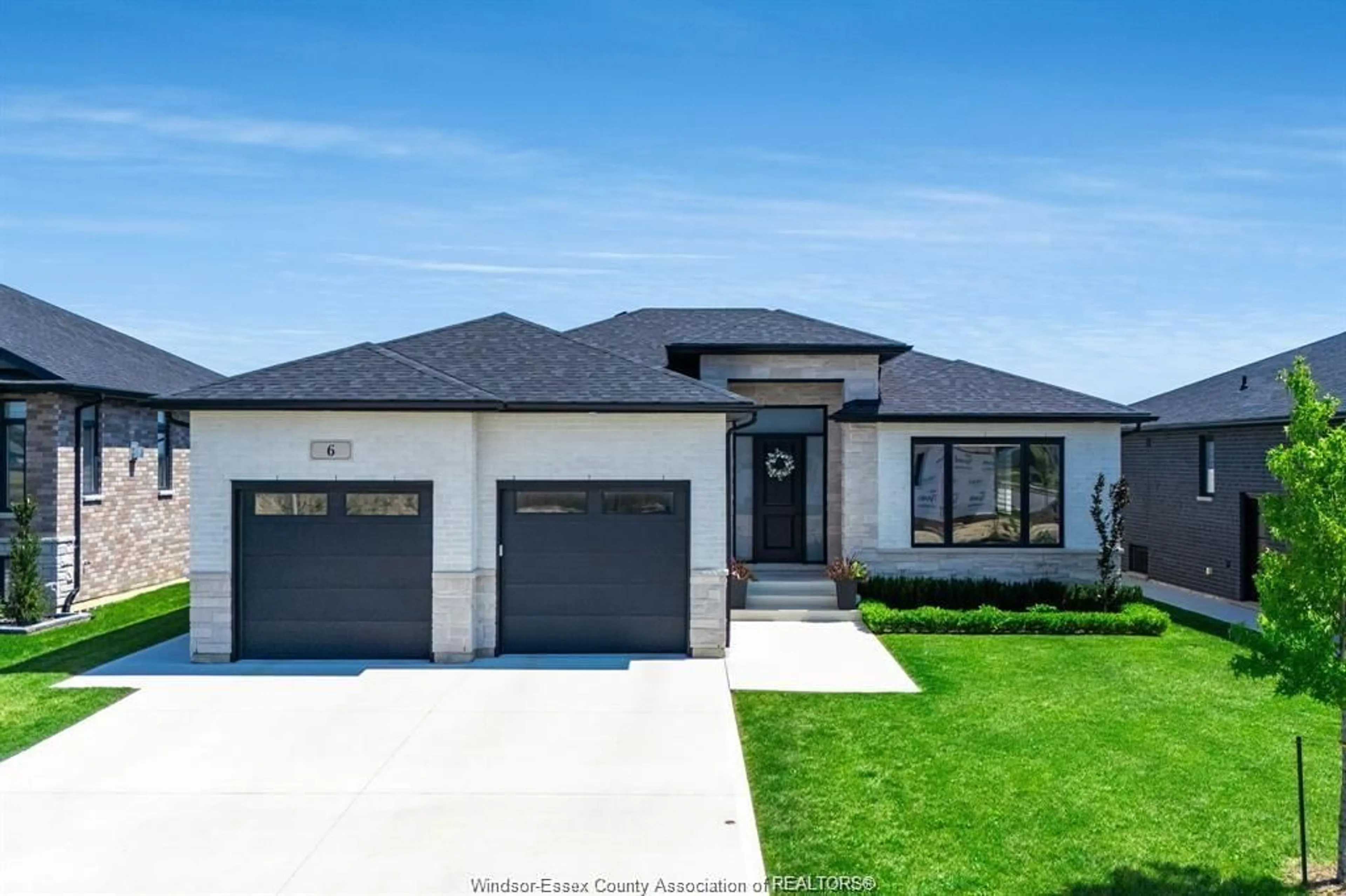 Home with vinyl exterior material, street for 6 HEATHVIEW Trail, Leamington Ontario N8H 0G3