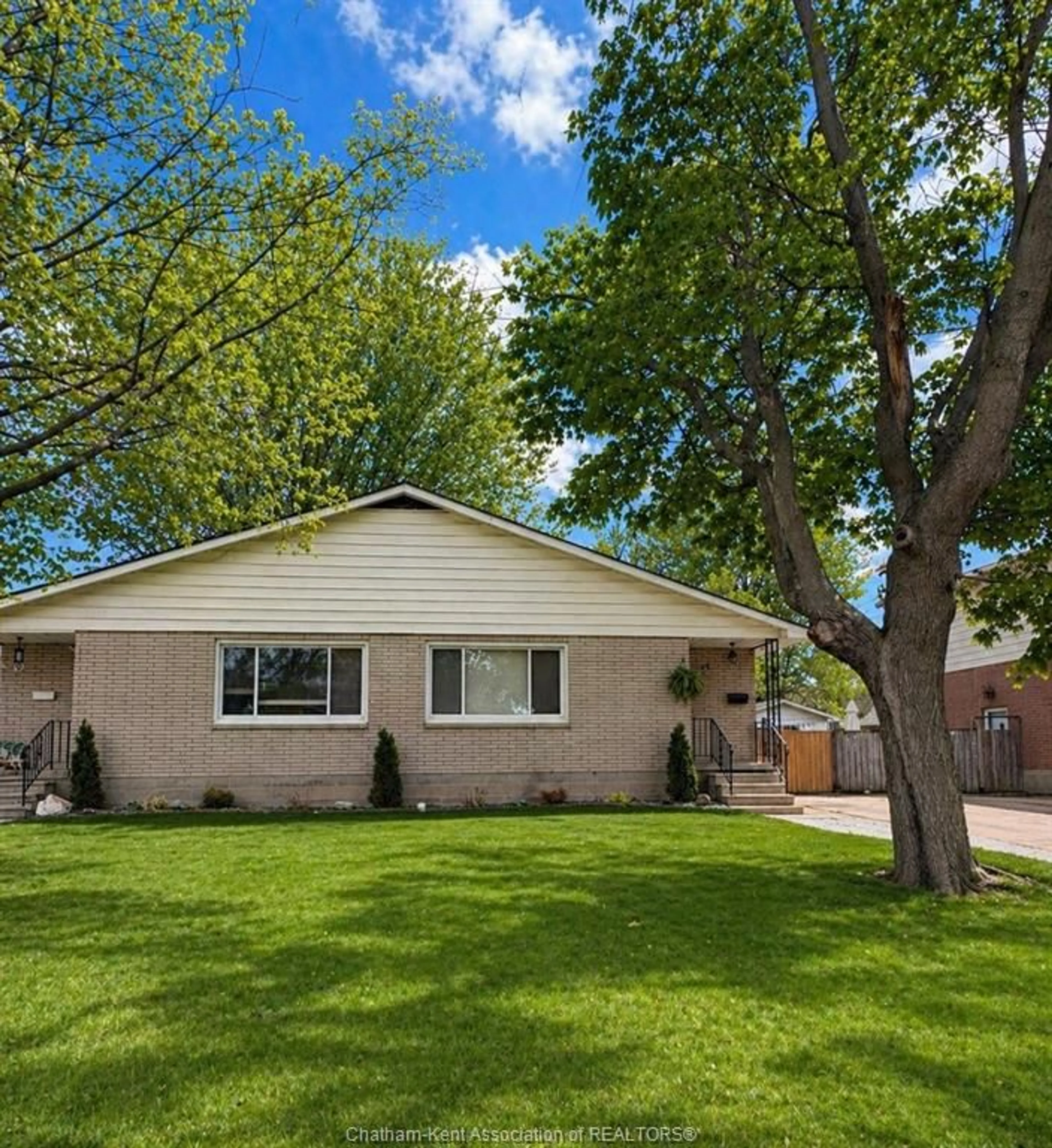 Home with vinyl exterior material, street for 24 Sussex St, Chatham Ontario N7L 1L8