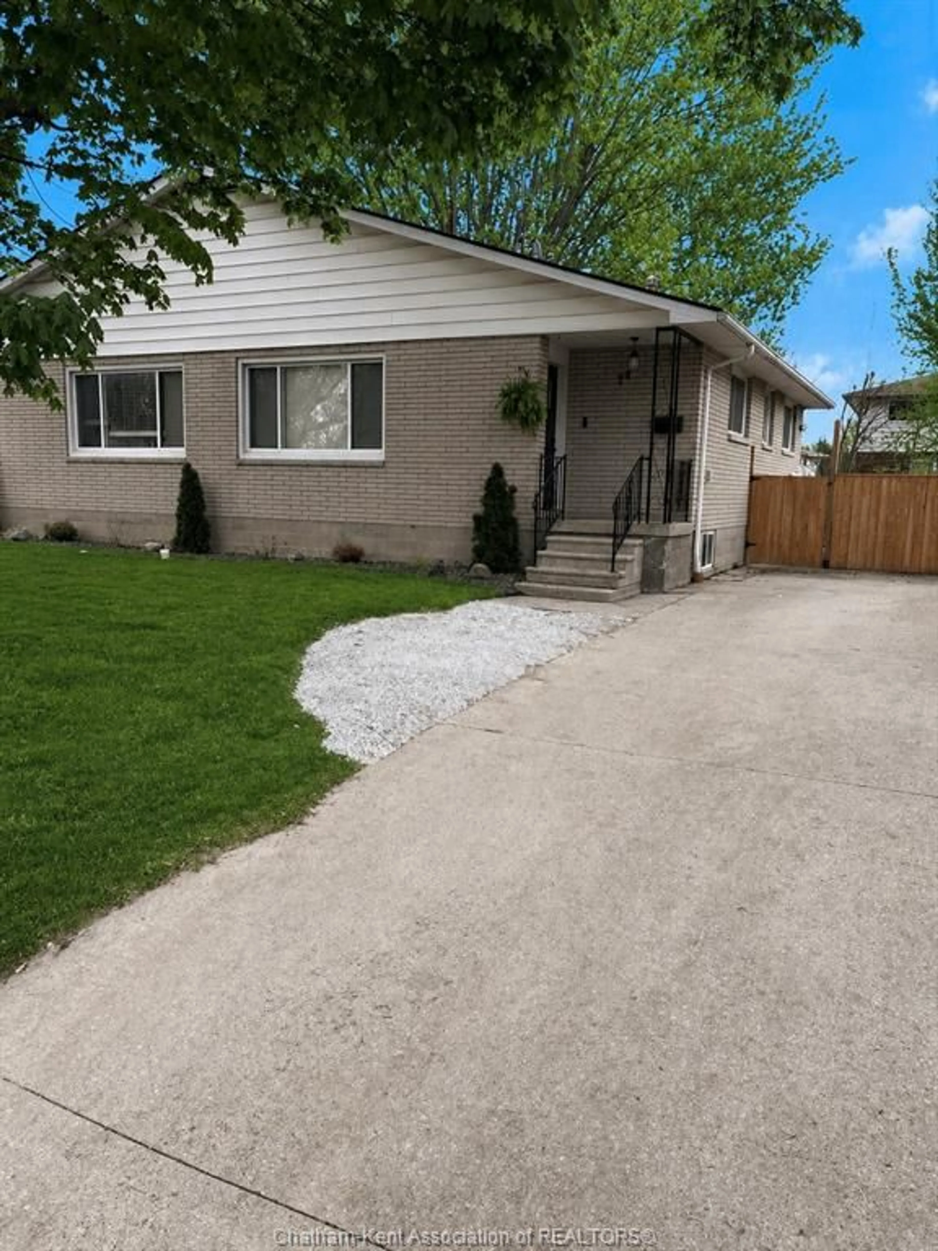 Home with vinyl exterior material, street for 24 Sussex St, Chatham Ontario N7L 1L8