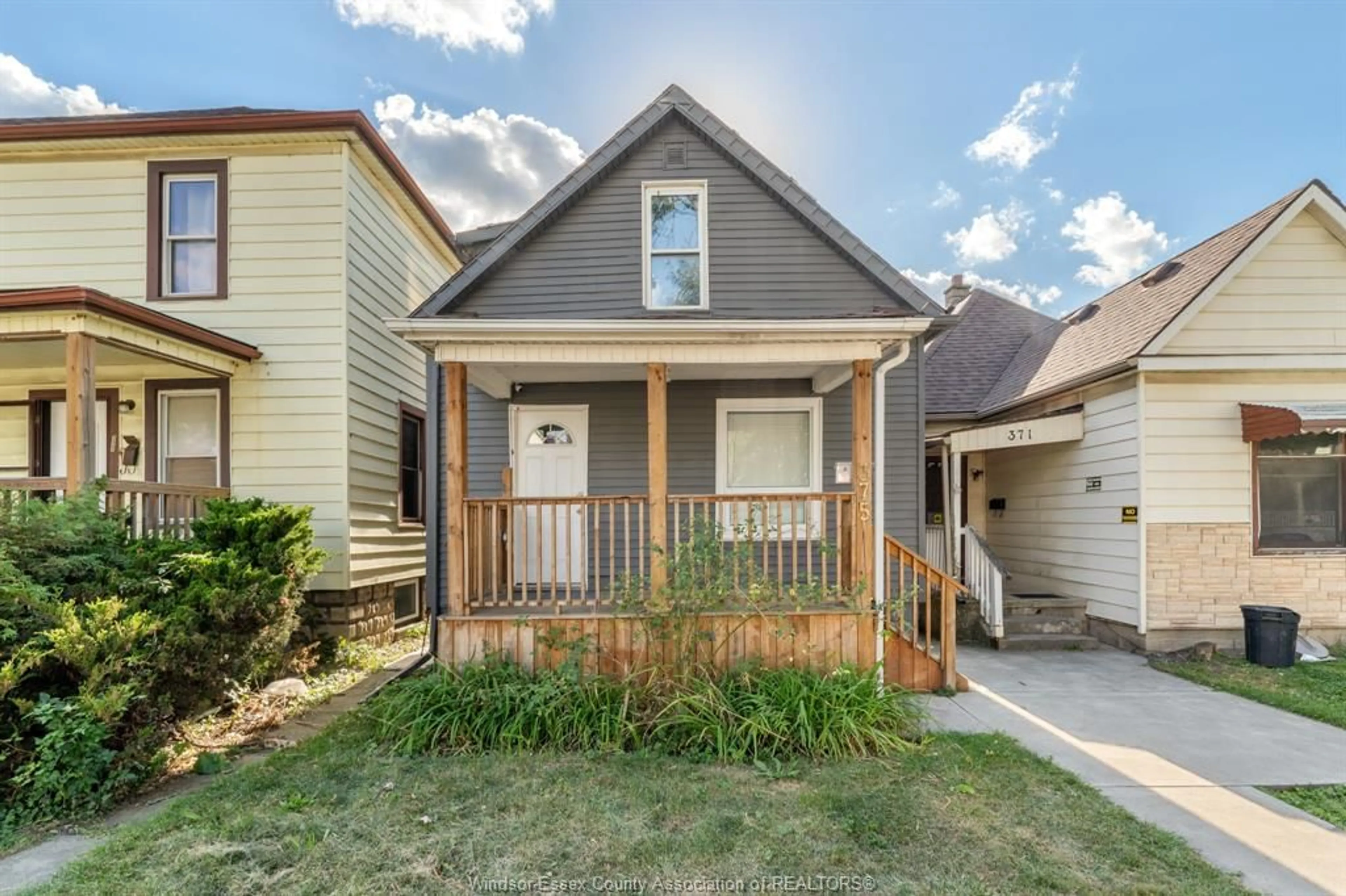 Home with vinyl exterior material, street for 375 Bridge, Windsor Ontario N9B 2M3