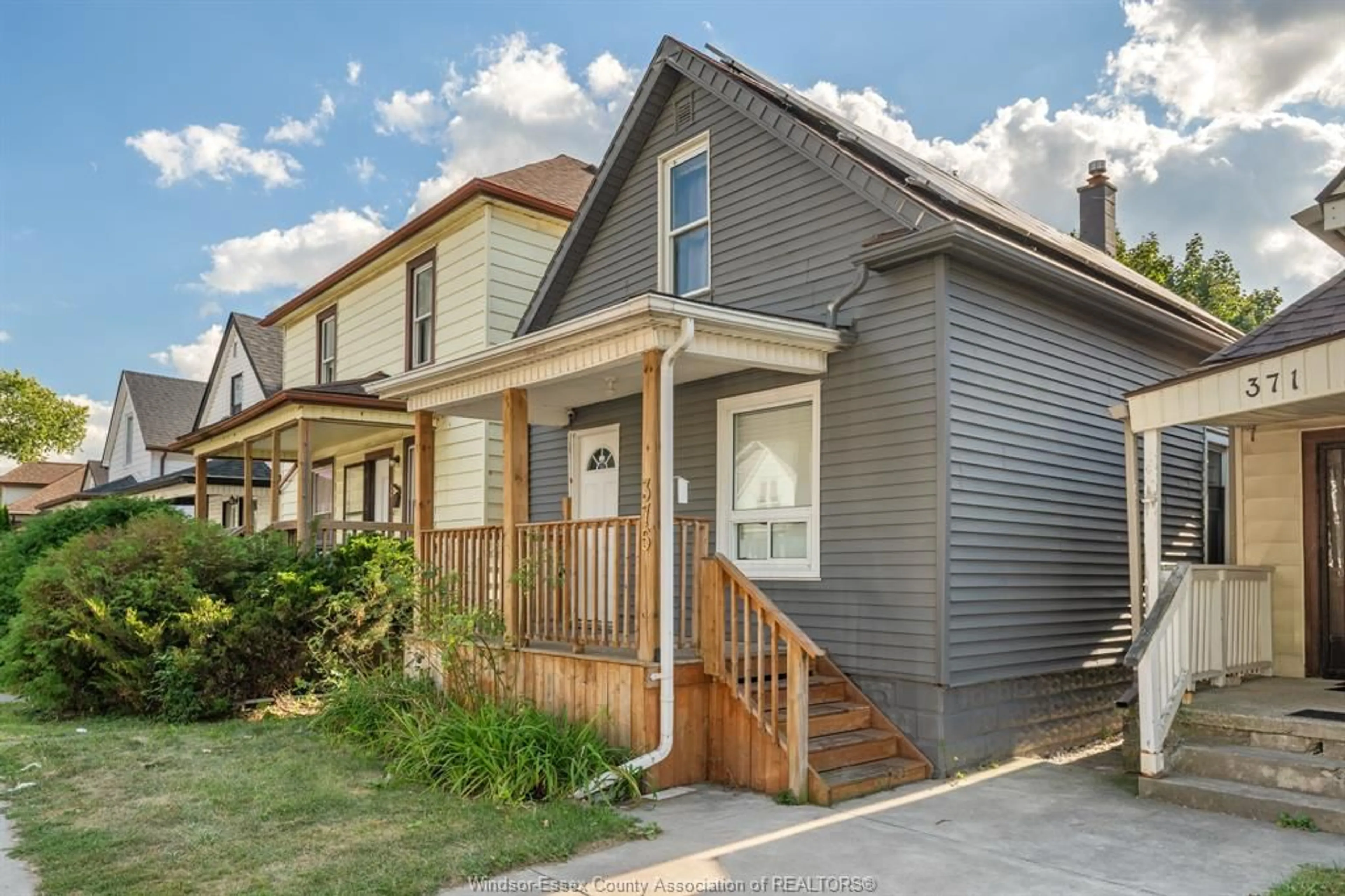 Home with vinyl exterior material, street for 375 Bridge, Windsor Ontario N9B 2M3