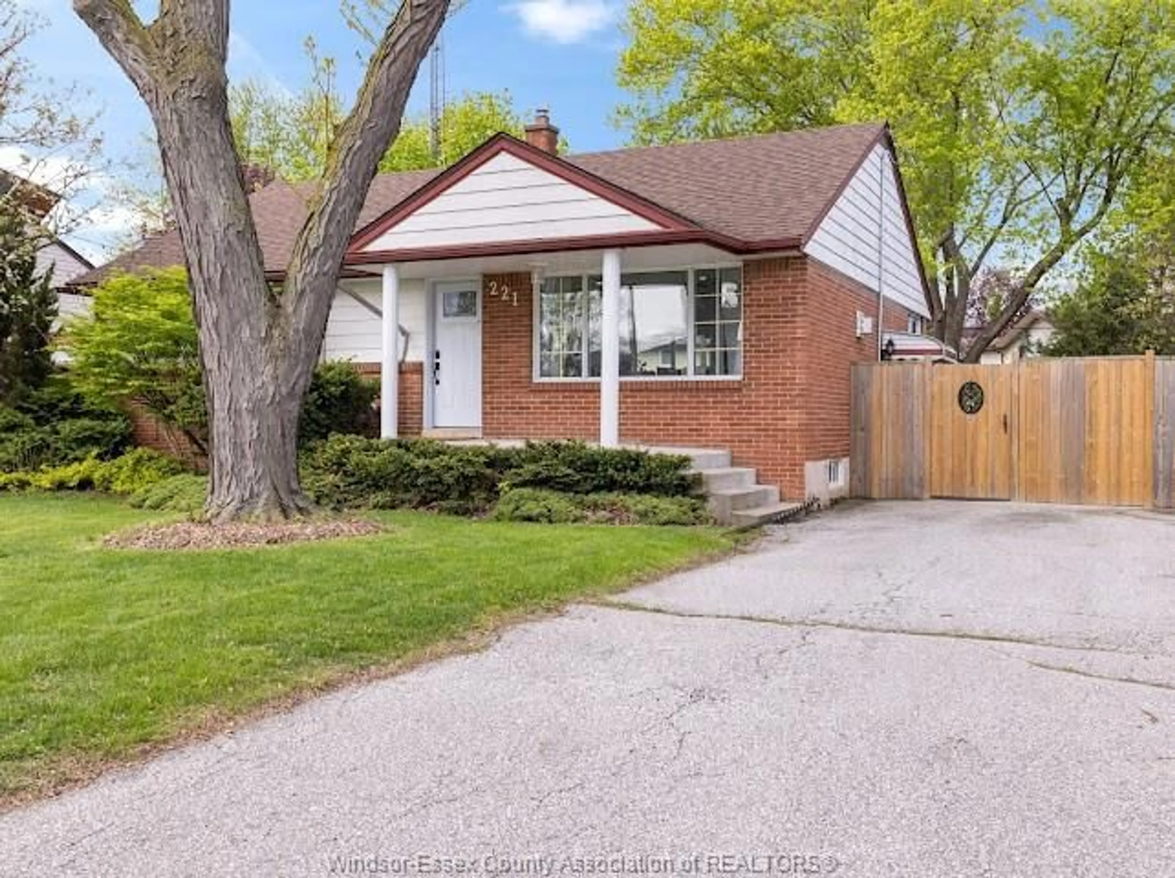 Home with brick exterior material, street for 221 GRACE Rd, Tecumseh Ontario N8N 2G6