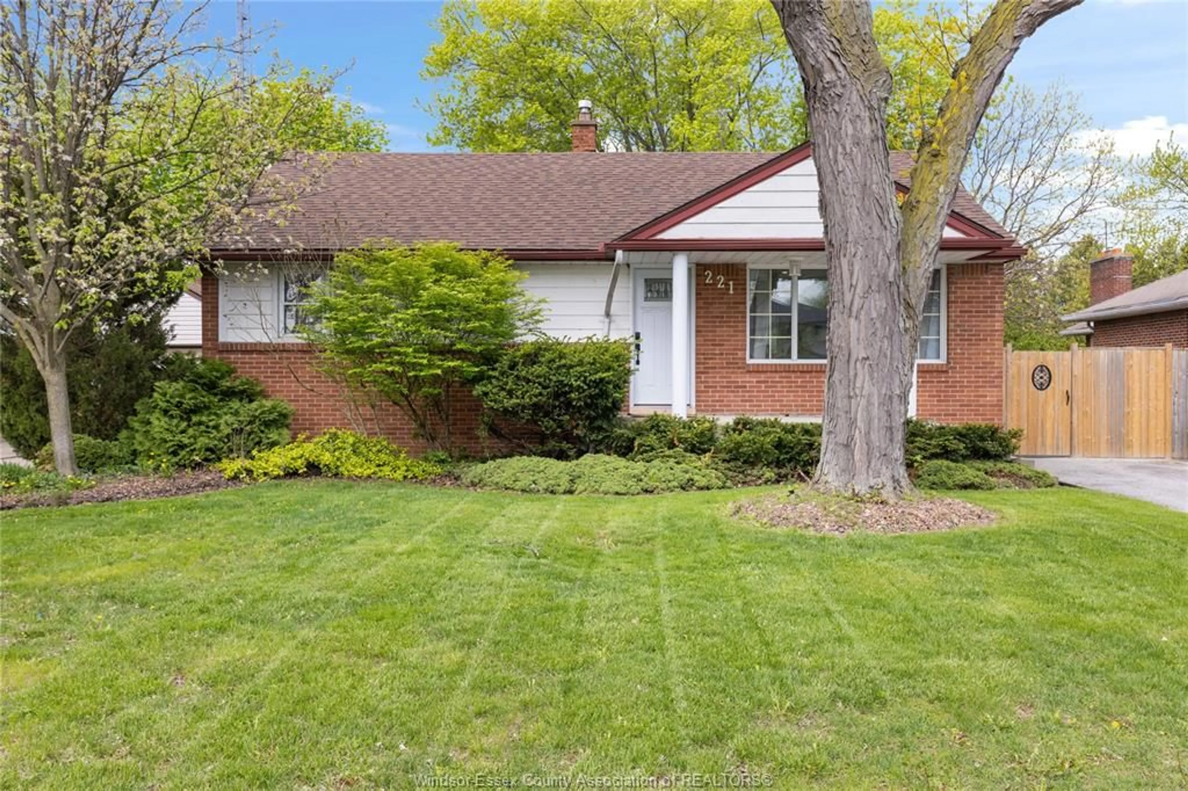 Home with brick exterior material, street for 221 GRACE Rd, Tecumseh Ontario N8N 2G6
