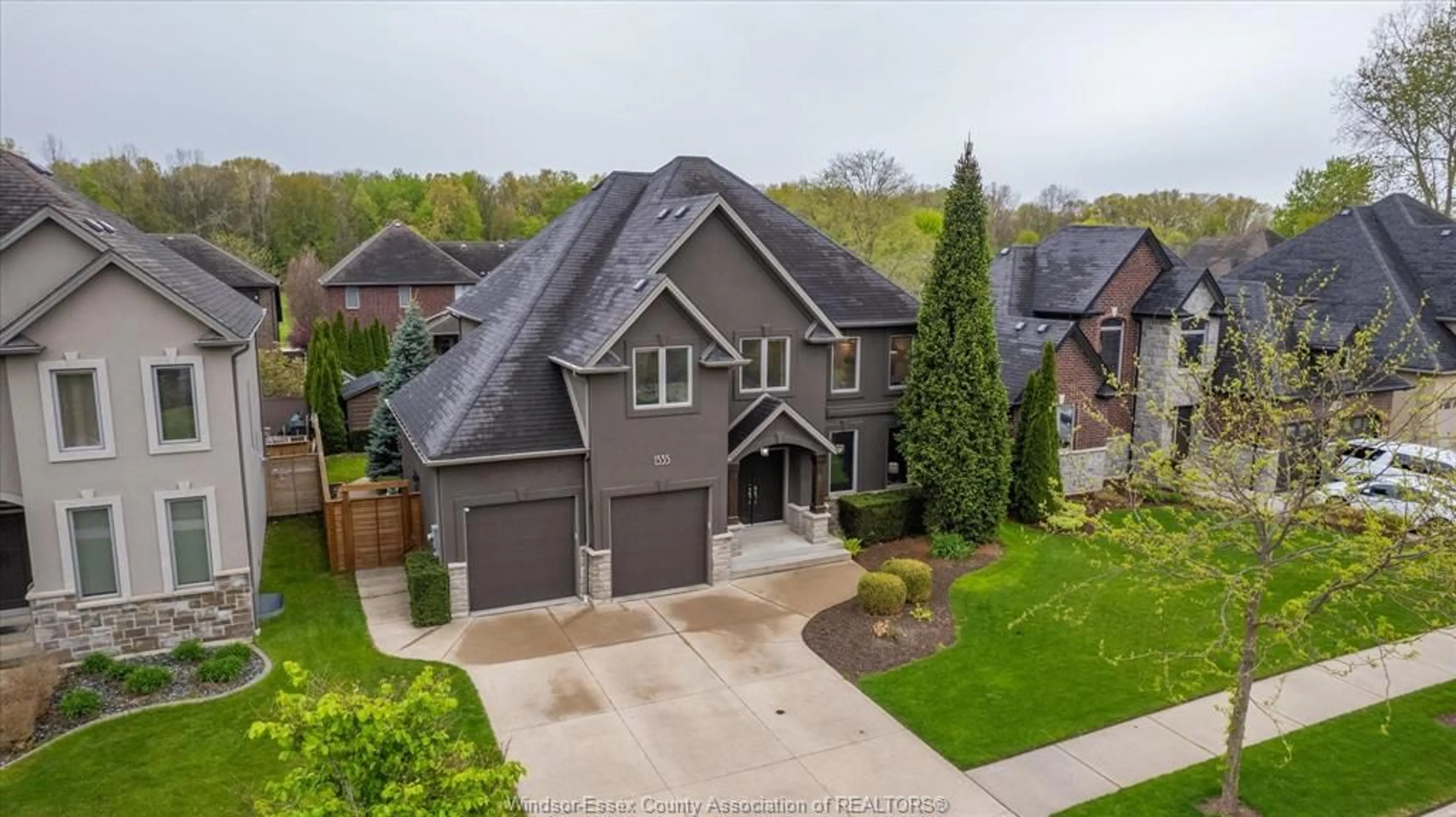 A pic from outside/outdoor area/front of a property/back of a property/a pic from drone, street for 1335 MAPLE, LaSalle Ontario N9J 0B3