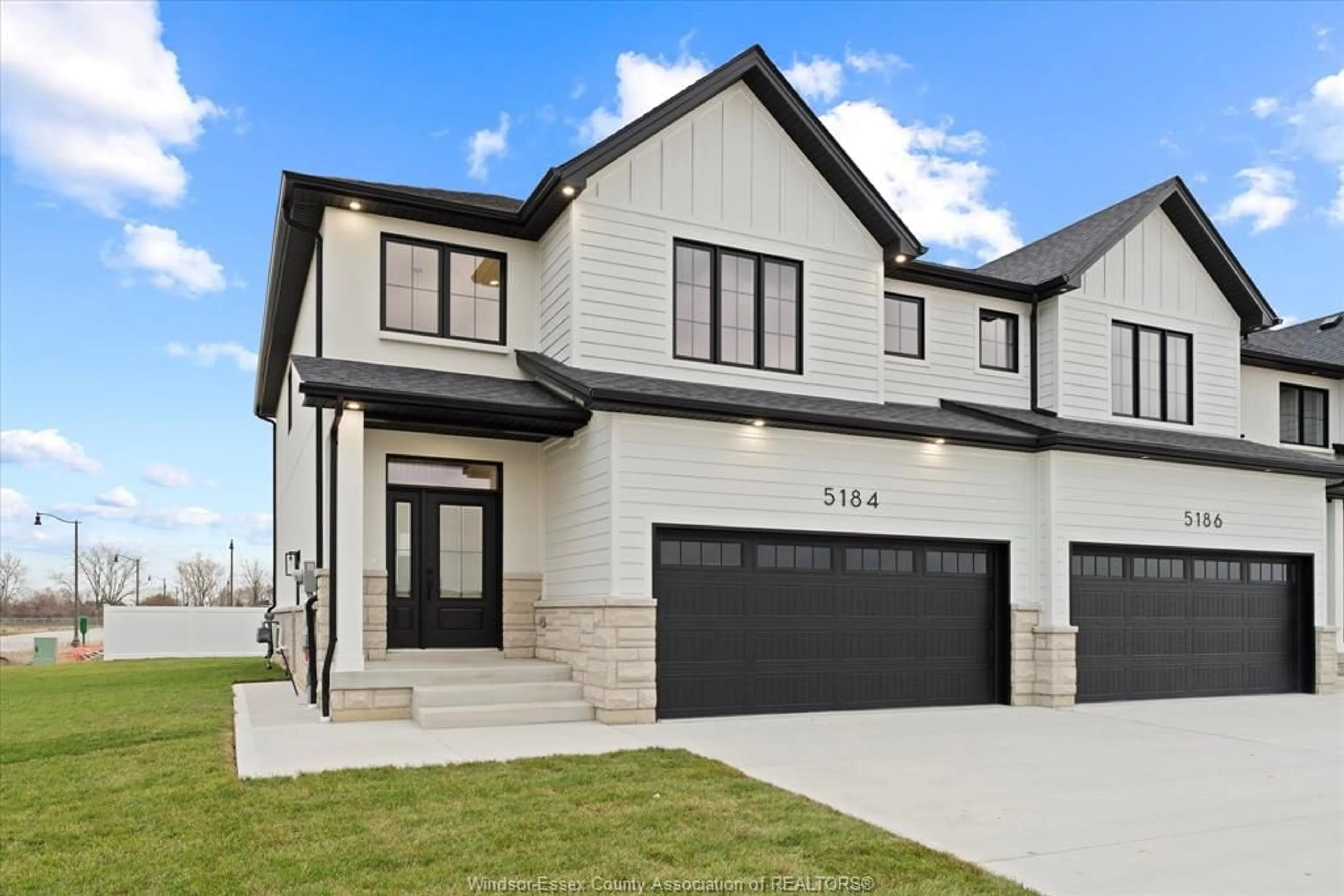 Home with vinyl exterior material, street for 5184 TALIA Trail, Tecumseh Ontario N0R 1K0
