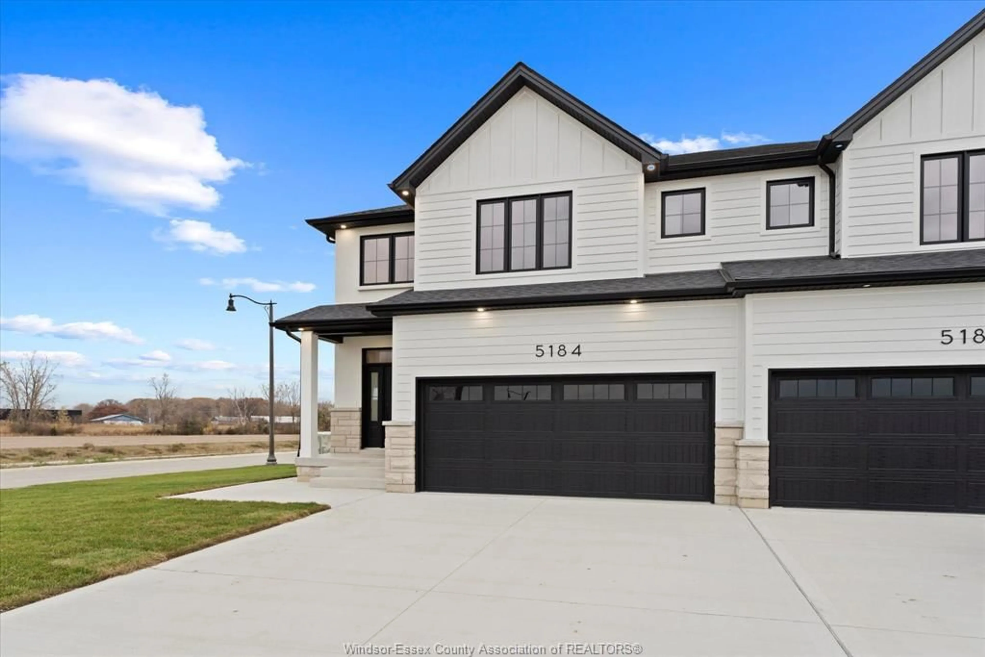 Home with vinyl exterior material, street for 5184 TALIA Trail, Tecumseh Ontario N0R 1K0