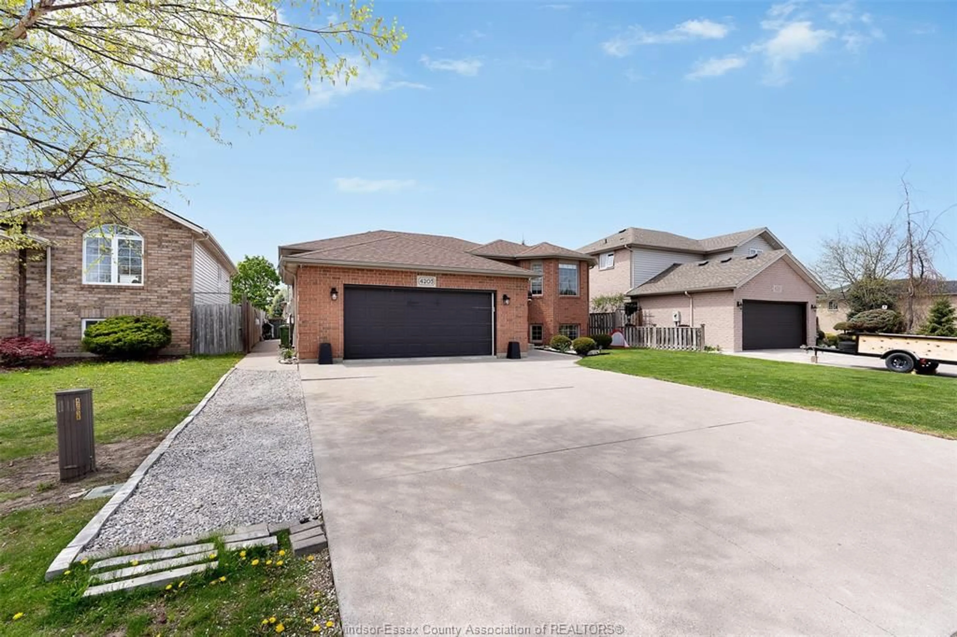 Home with brick exterior material, street for 4205 BARTON Cres, Windsor Ontario N9G 2V5
