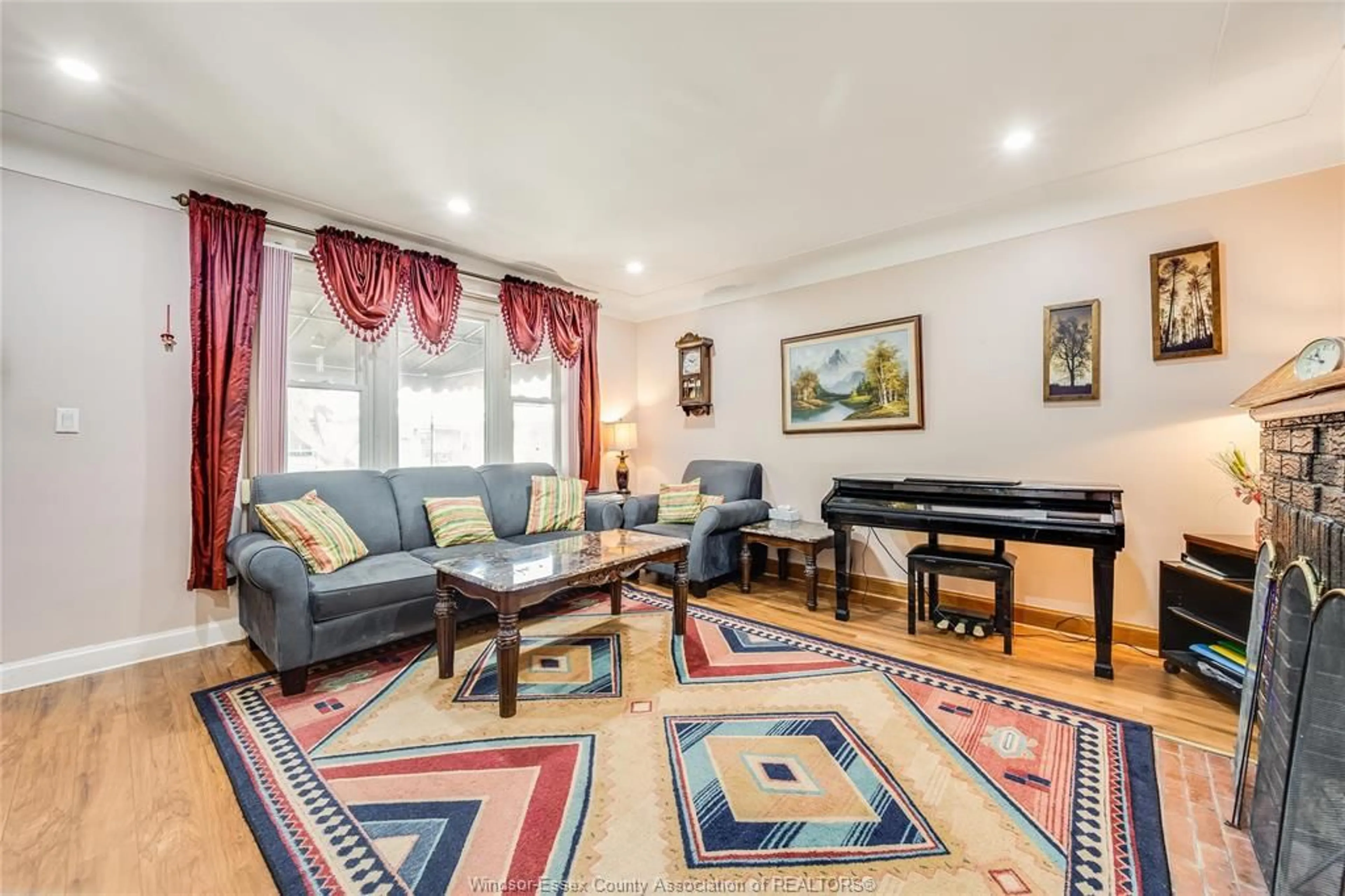 Living room with furniture, carpet floor for 1236 HICKORY Rd, Windsor Ontario N8Y 3S6