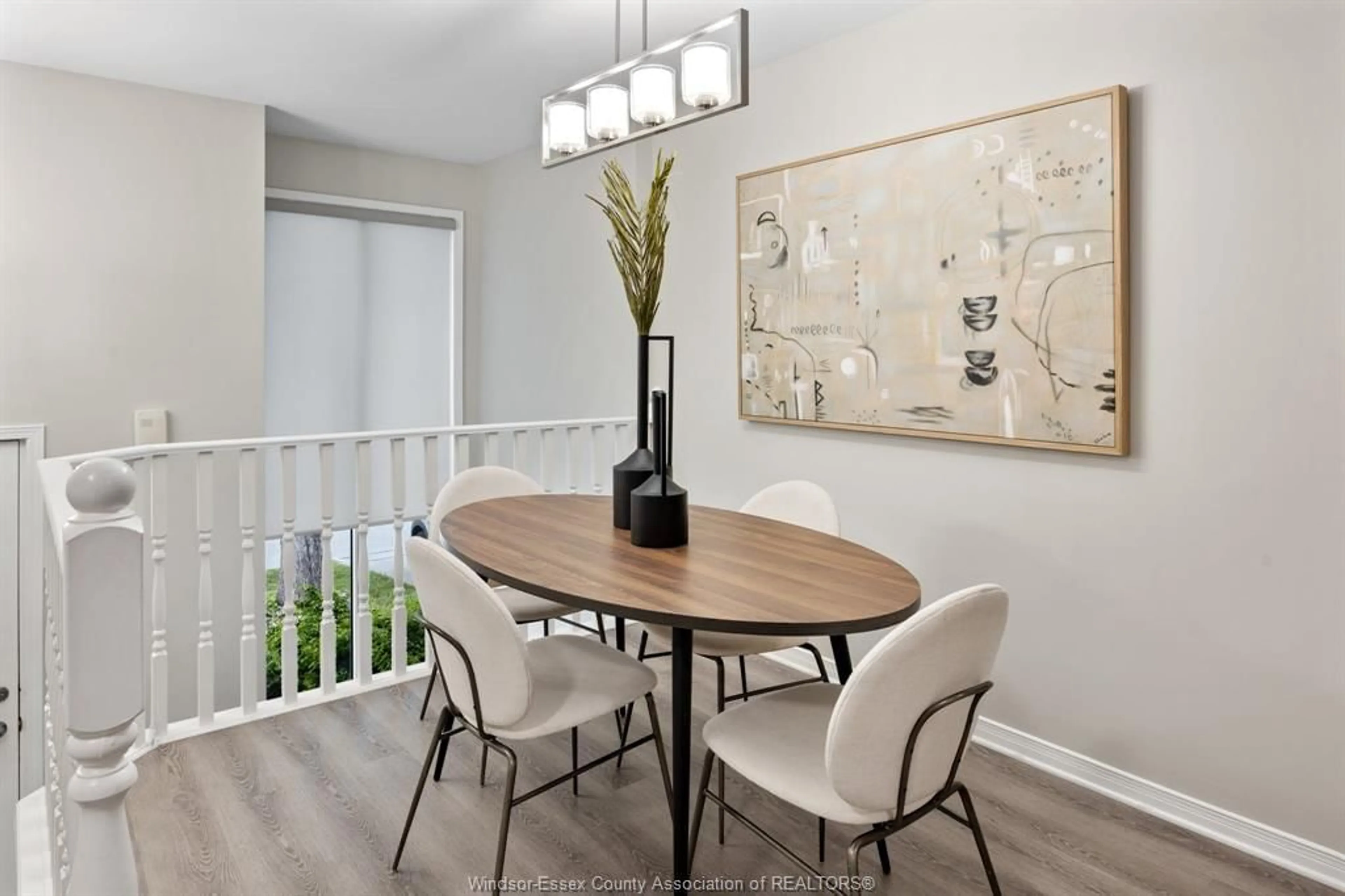 Dining room, wood/laminate floor for 1405 MICKAILA Cres, Tecumseh Ontario N8N 4Z2