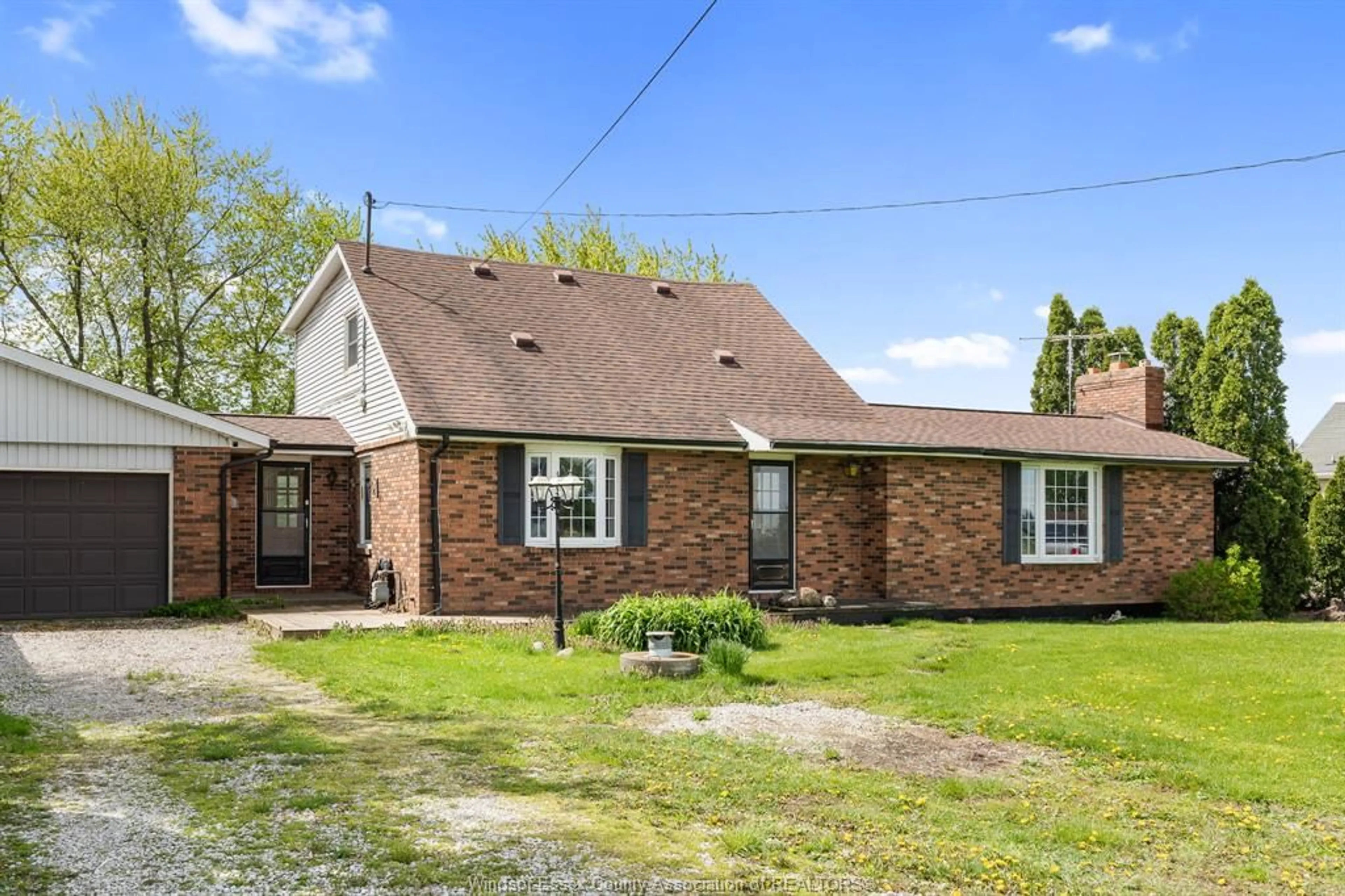 Home with brick exterior material, street for 220 Road 8, Kingsville Ontario N8M 2X5