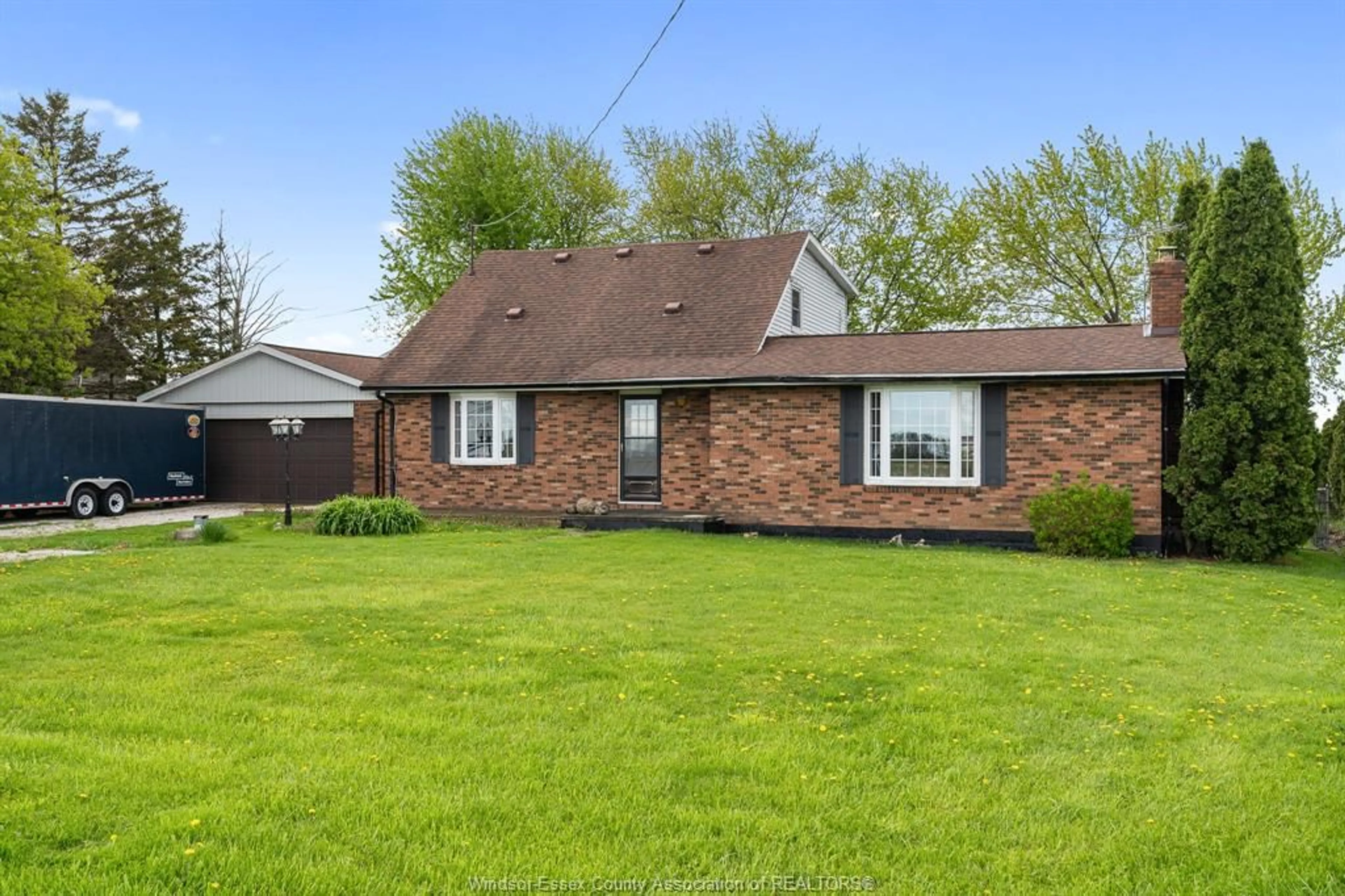 Home with brick exterior material, street for 220 Road 8, Kingsville Ontario N8M 2X5