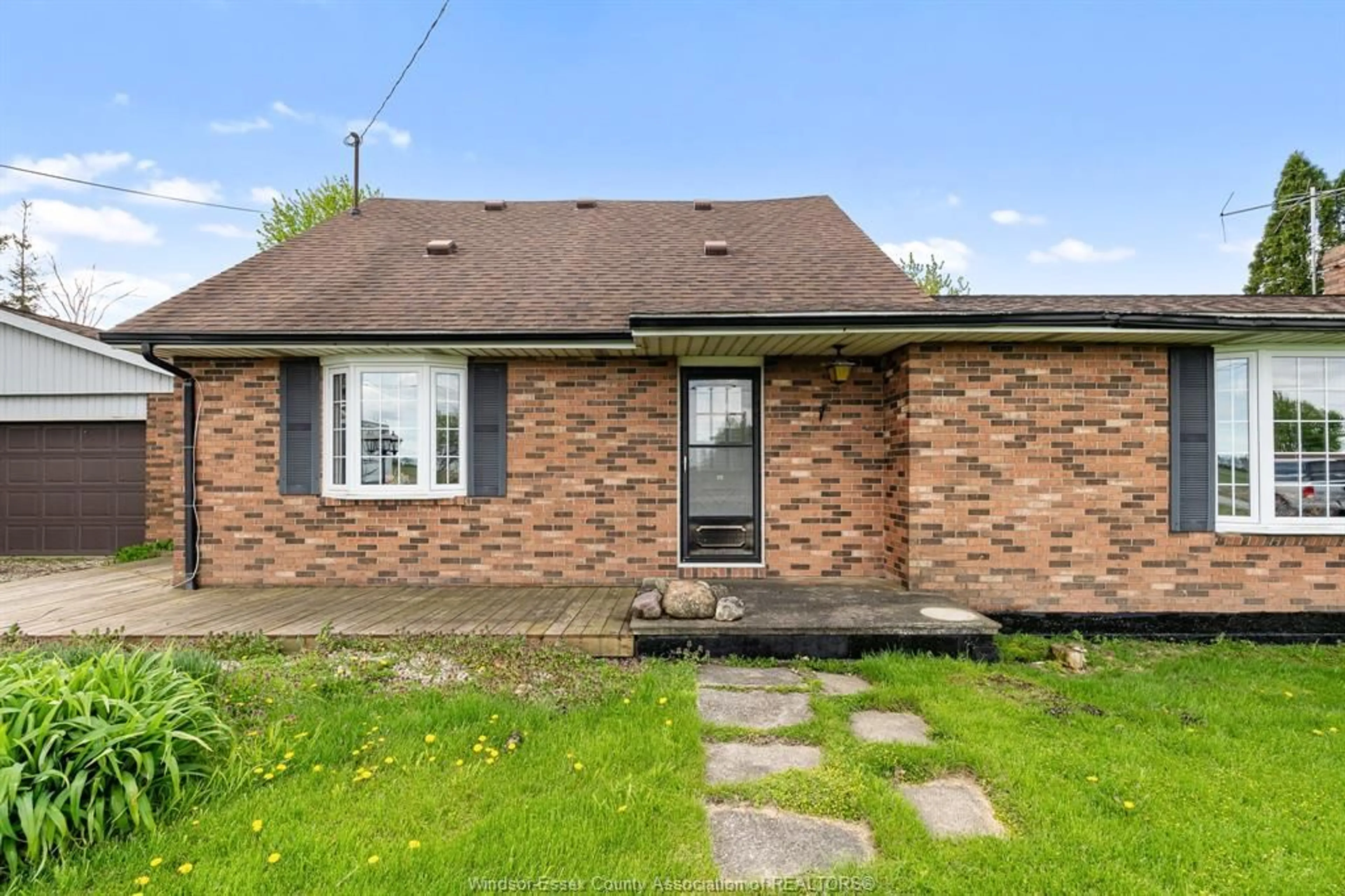 Home with brick exterior material, street for 220 Road 8, Kingsville Ontario N8M 2X5