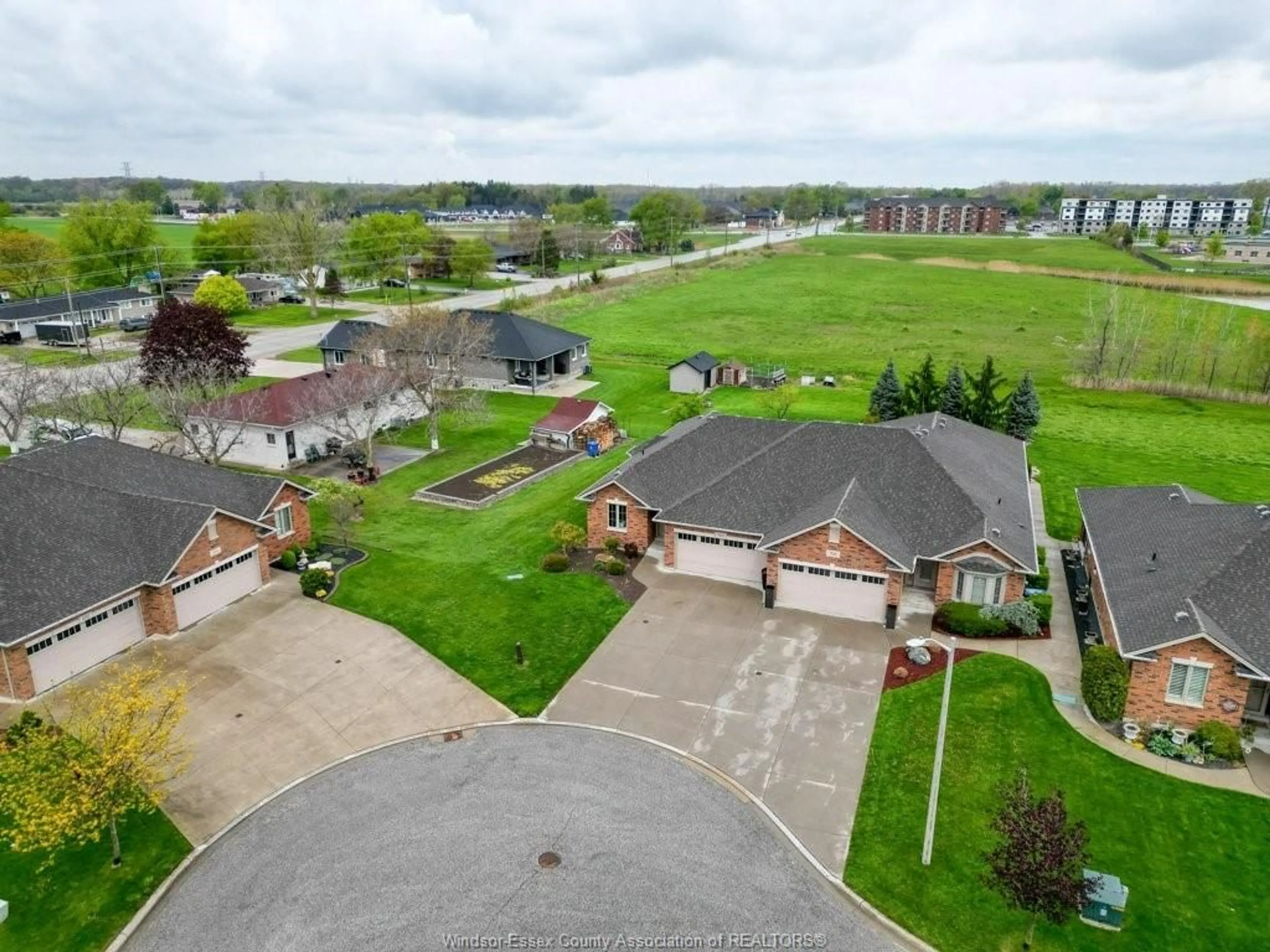 A pic from outside/outdoor area/front of a property/back of a property/a pic from drone, water/lake/river/ocean view for 702 COMMISSO Cres, LaSalle Ontario N9H 0C8