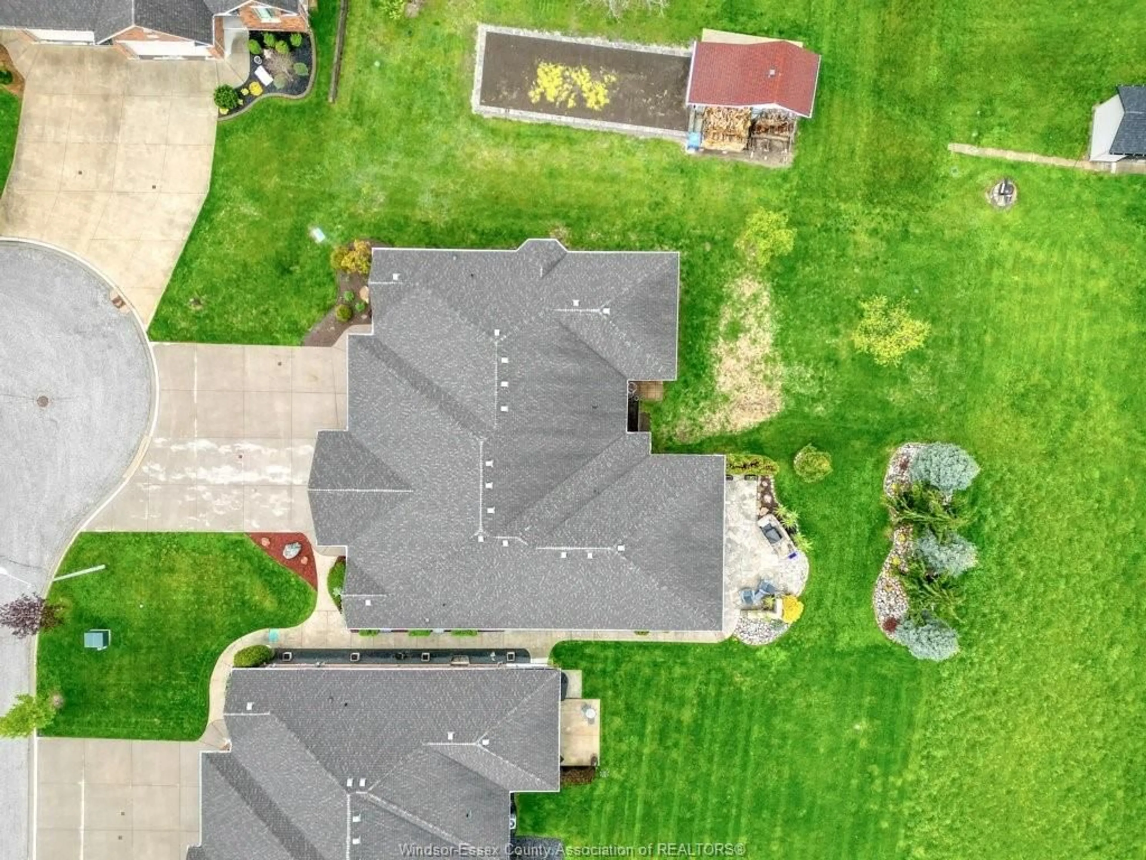 A pic from outside/outdoor area/front of a property/back of a property/a pic from drone, street for 702 COMMISSO Cres, LaSalle Ontario N9H 0C8