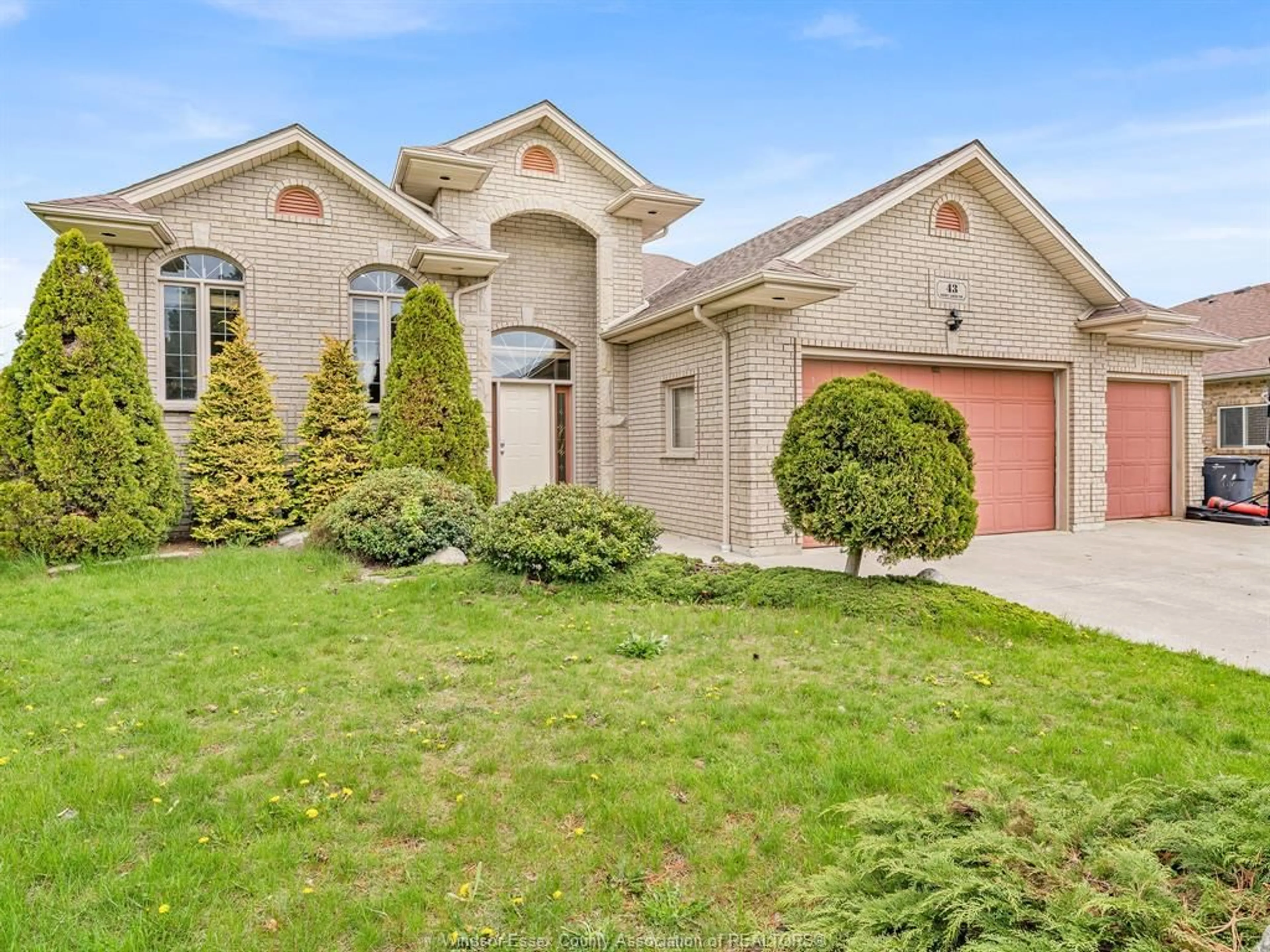 Home with brick exterior material, street for 43 Sandy Lake Dr, Leamington Ontario N8H 5K4