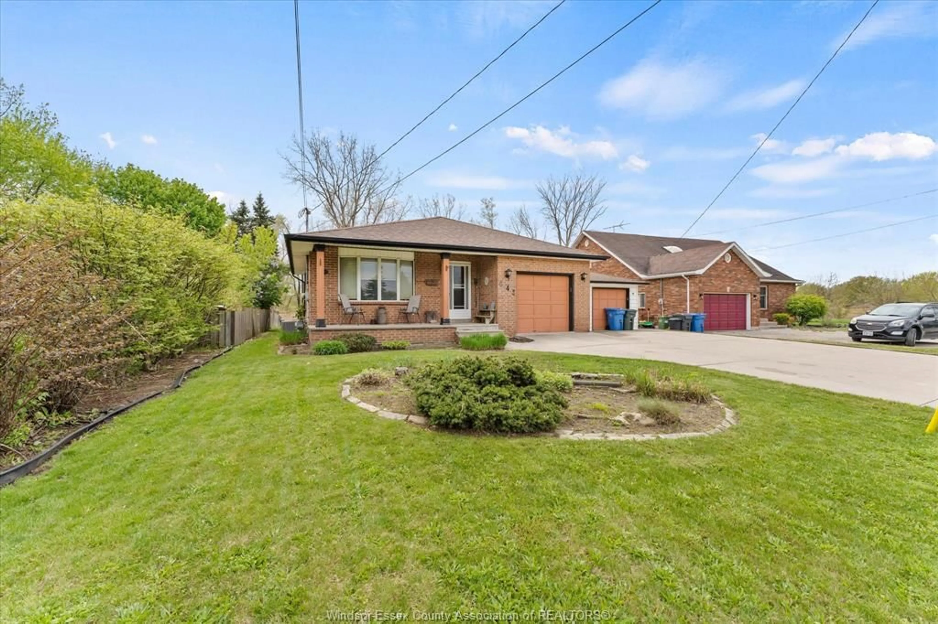 A pic from outside/outdoor area/front of a property/back of a property/a pic from drone, street for 645 HIGHWAY 18, LaSalle Ontario N9J 1A5