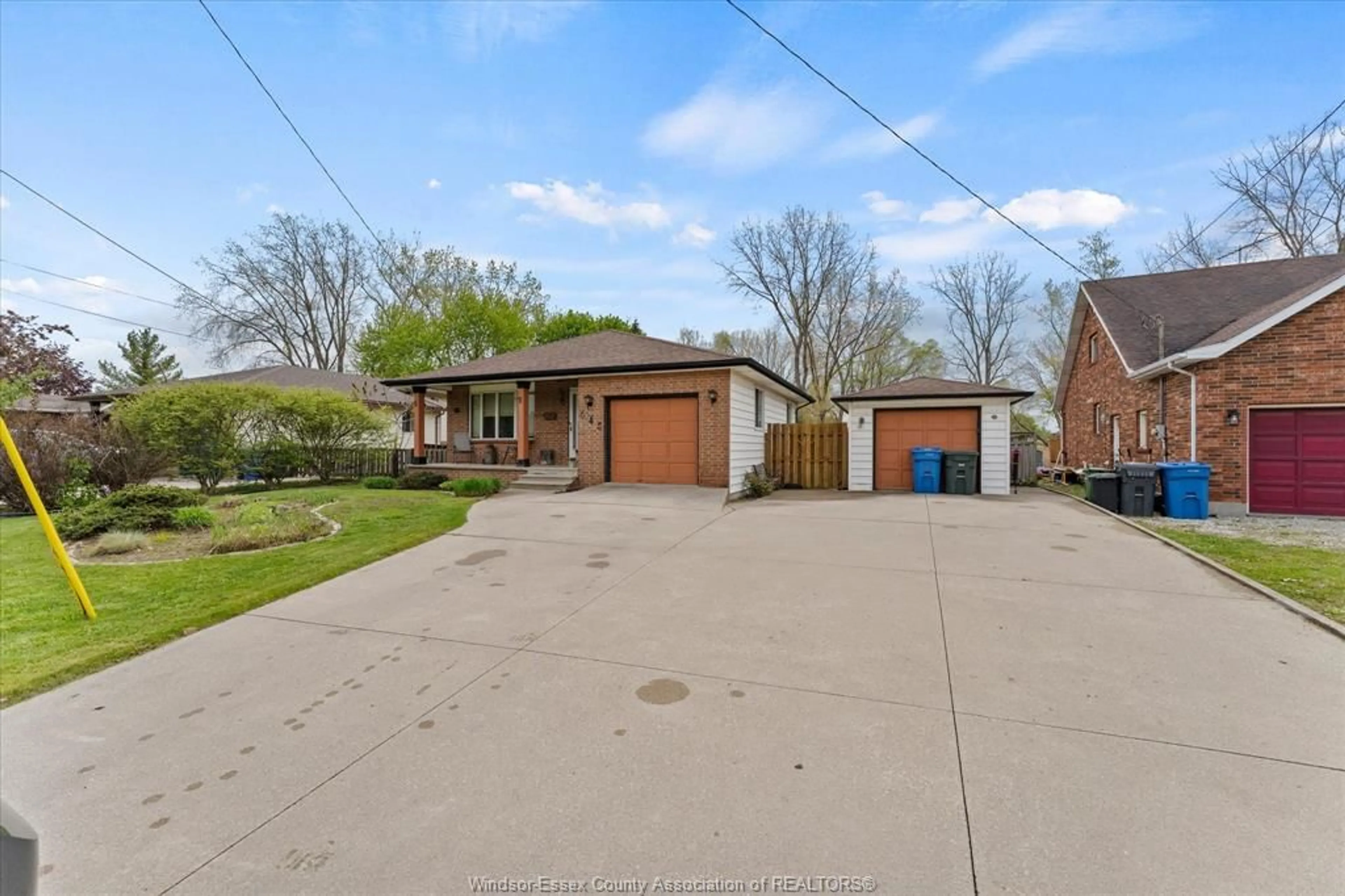 A pic from outside/outdoor area/front of a property/back of a property/a pic from drone, street for 645 HIGHWAY 18, LaSalle Ontario N9J 1A5