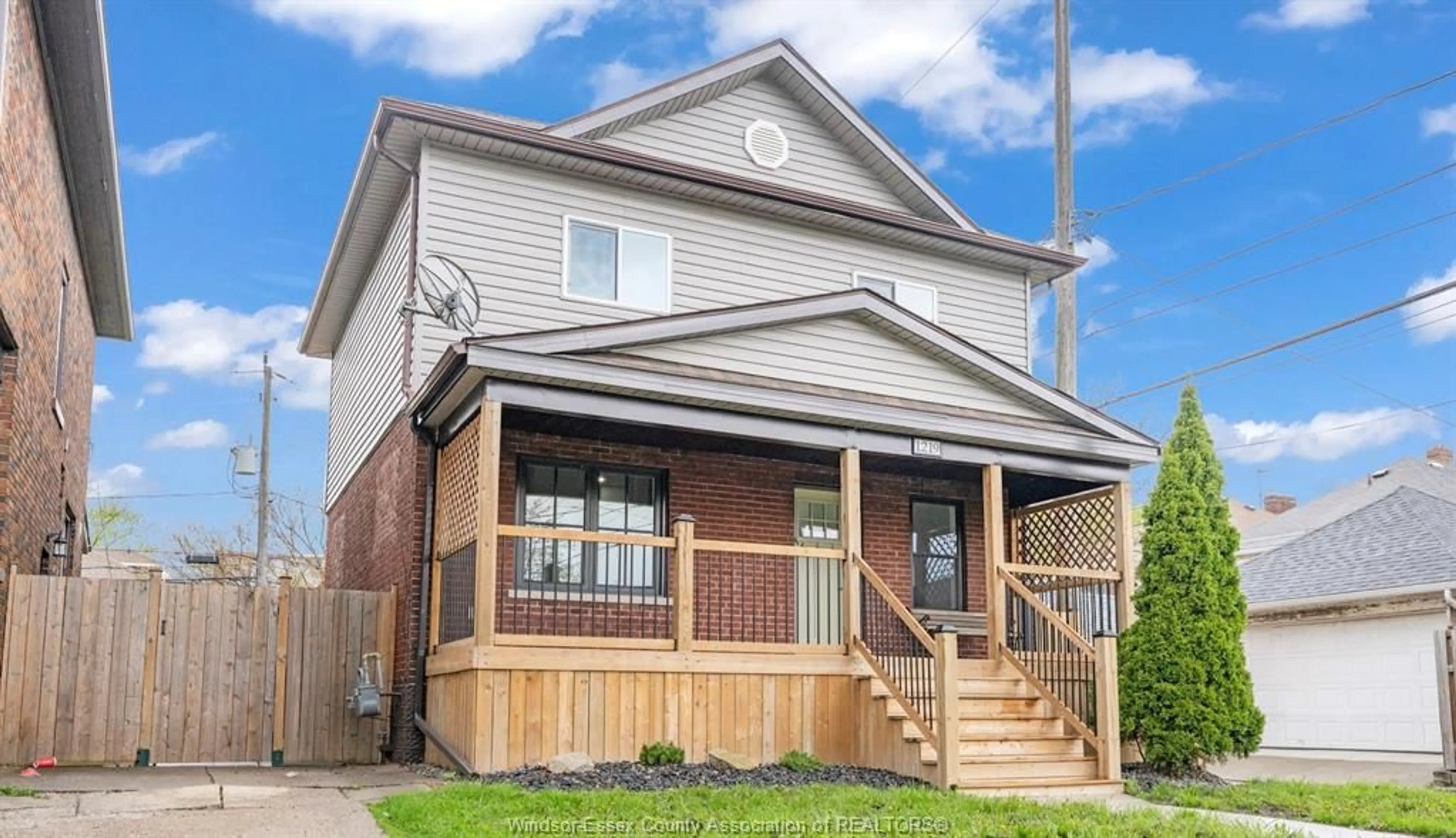 Home with brick exterior material, street for 1219 ELSMERE Ave, Windsor Ontario N9A 2B1