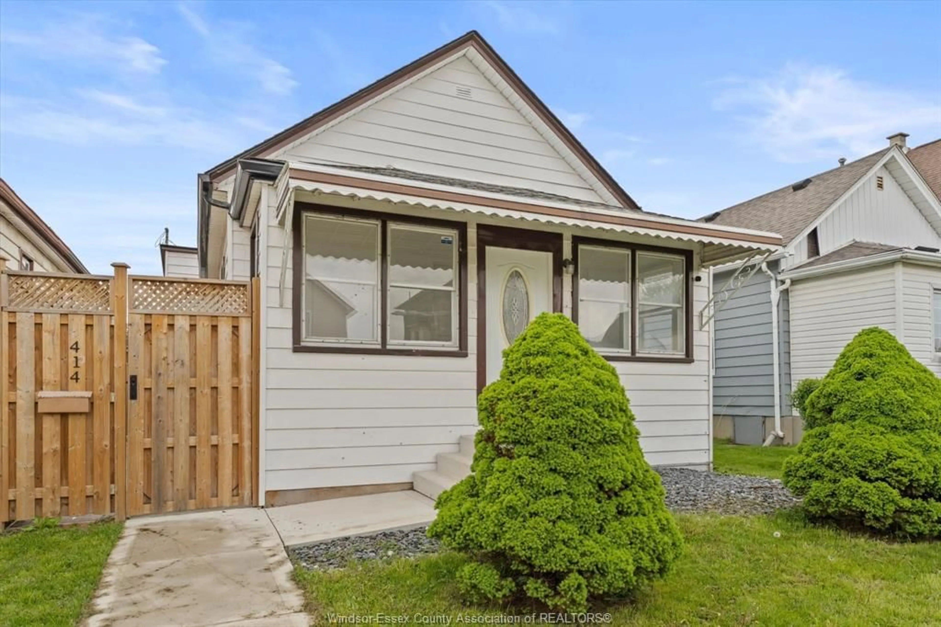 Home with vinyl exterior material, street for 414 PARENT Ave, Windsor Ontario N9A 2C1