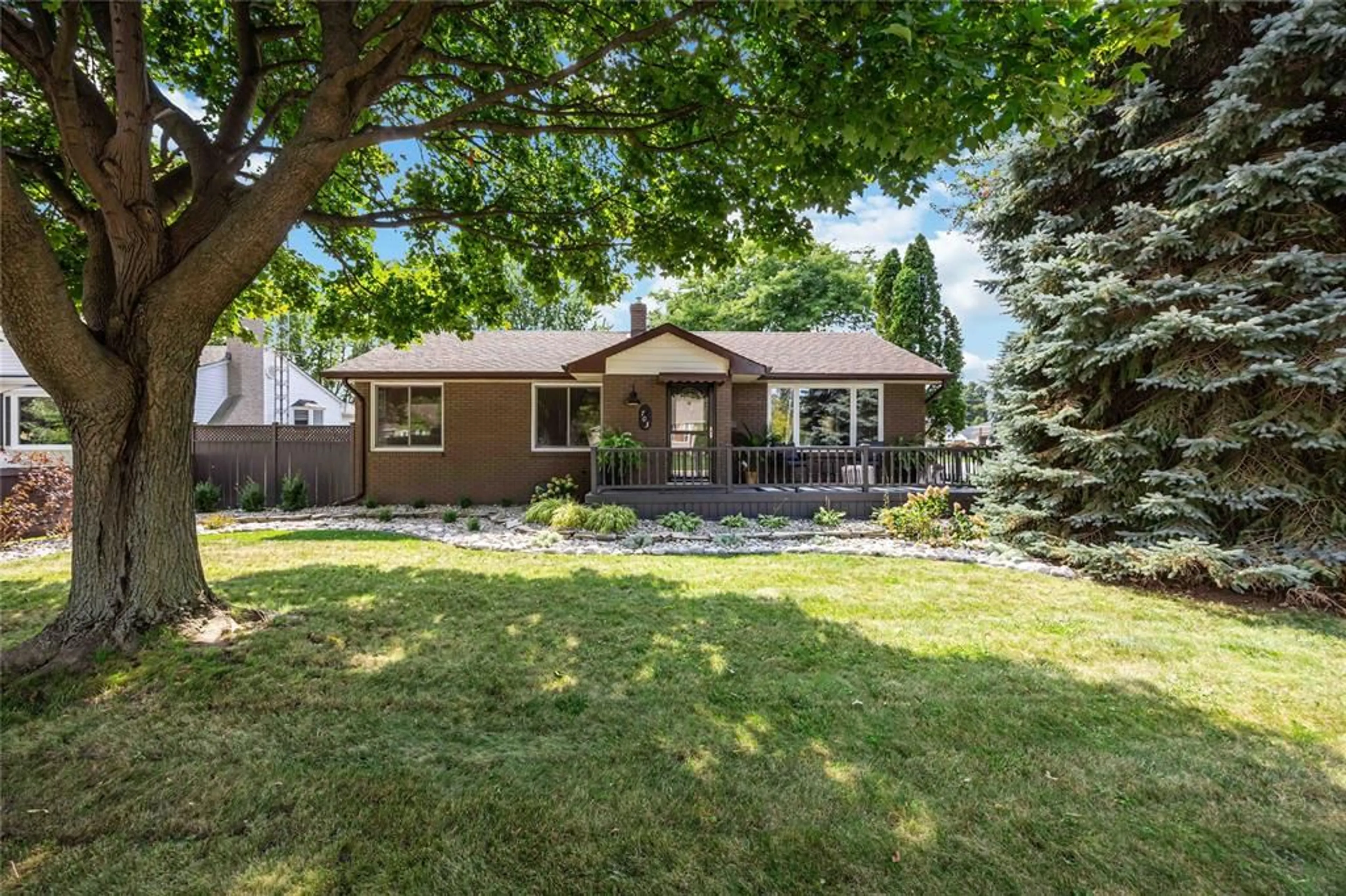 Home with brick exterior material, street for 703 MICHIGAN Ave, Point Edward Ontario N7V 1G9