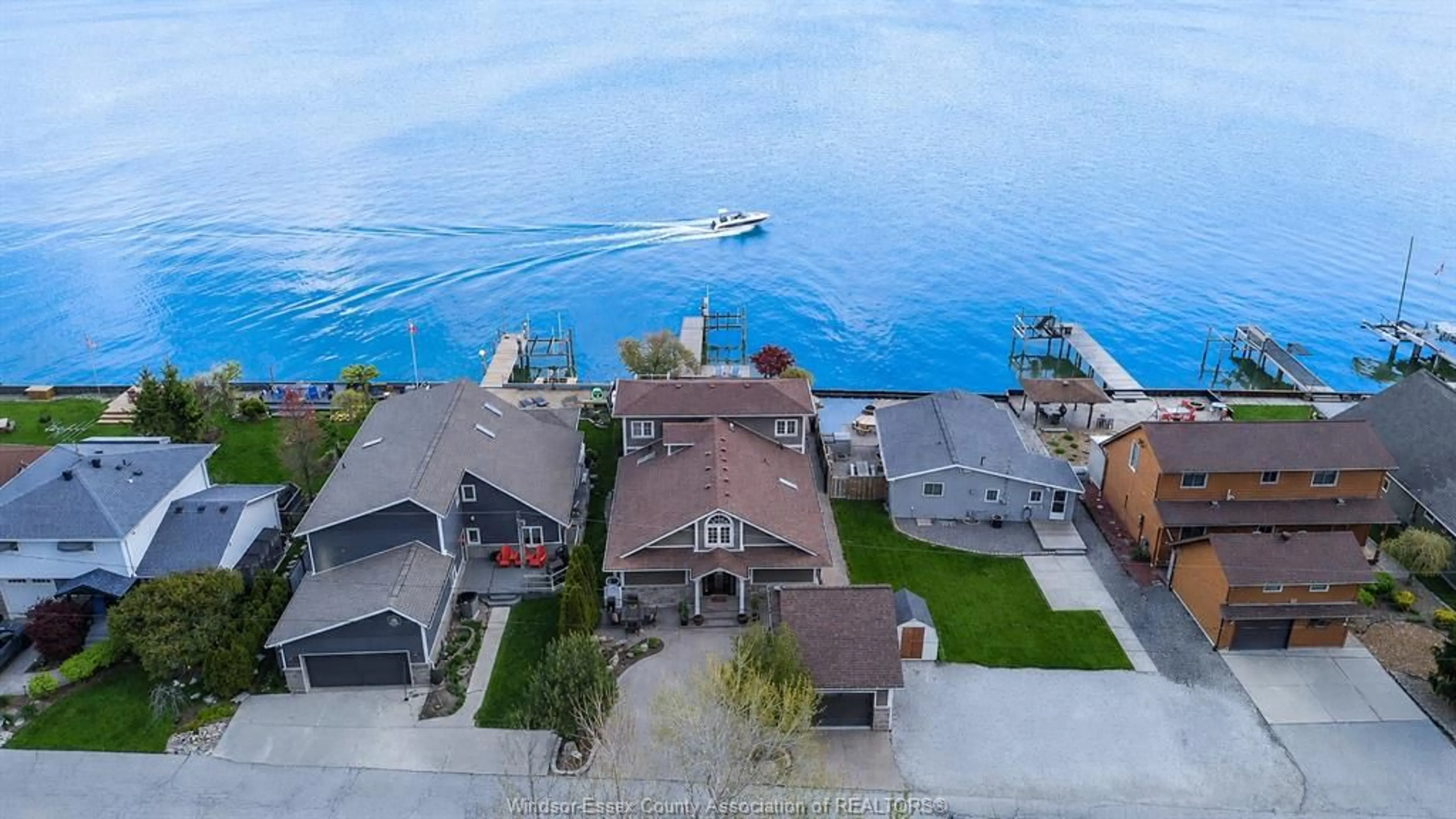 A pic from outside/outdoor area/front of a property/back of a property/a pic from drone, water/lake/river/ocean view for 1472 CAILLE AVE, Belle River Ontario N8L 0J2