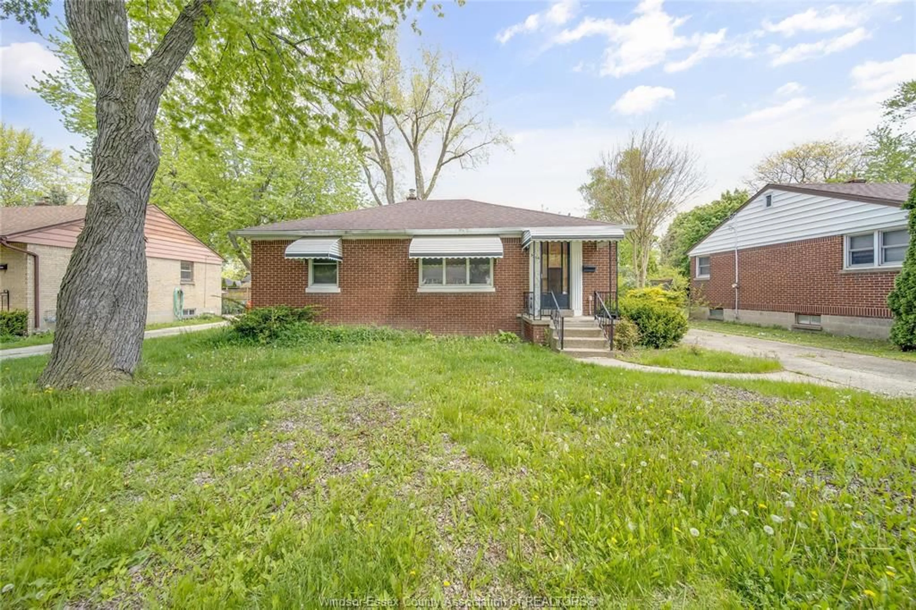 Home with brick exterior material, street for 3264 DOMINION Blvd, Windsor Ontario N9E 2N5