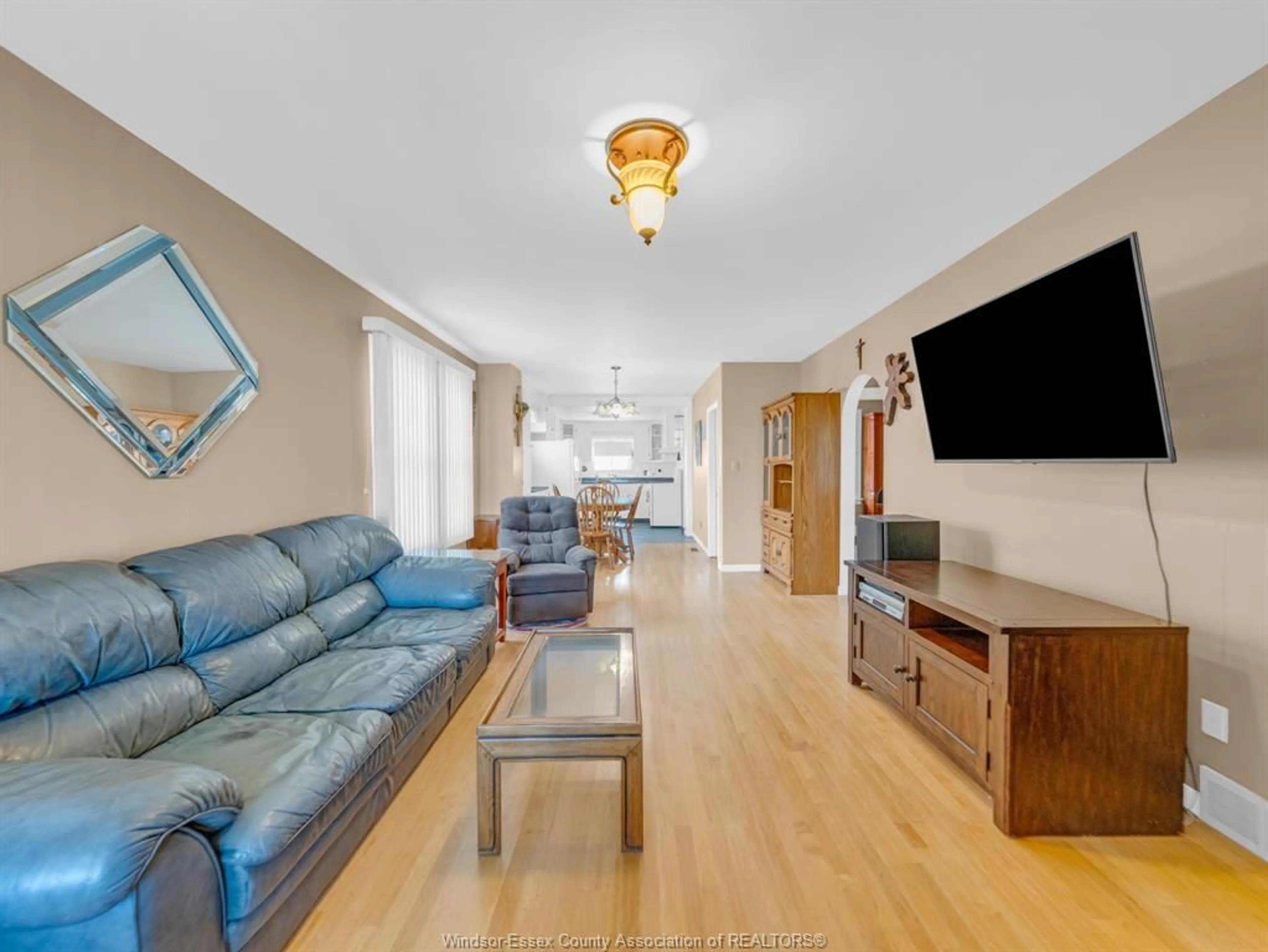 Living room with furniture, wood/laminate floor for 1488 PIERRE Ave, Windsor Ontario N8X 4P3