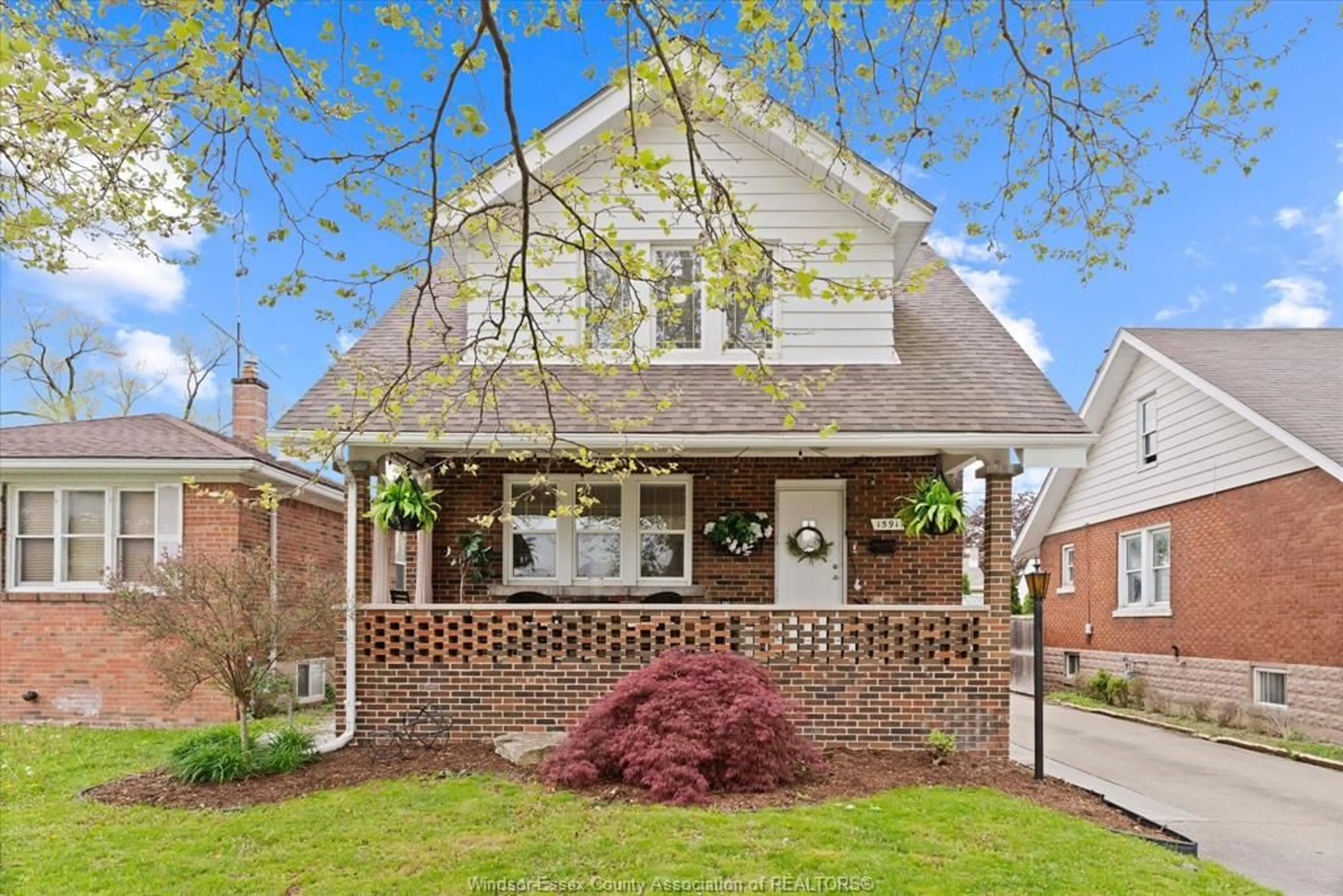 Home with brick exterior material, street for 1591 Pillette Rd, Windsor Ontario N8Y 3C3