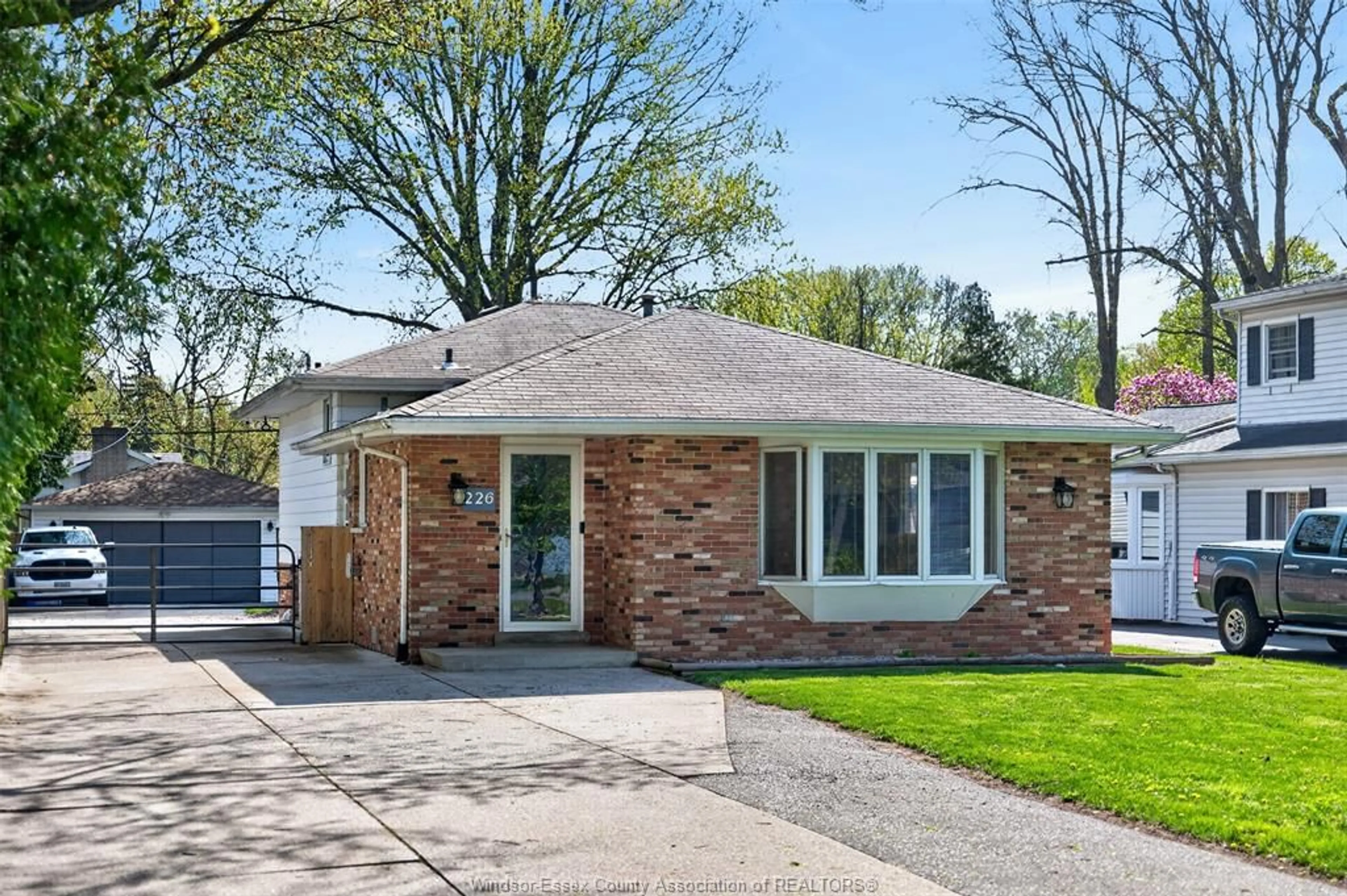 Home with brick exterior material, street for 226 EDGEWATER Blvd, Tecumseh Ontario N8N 2H2