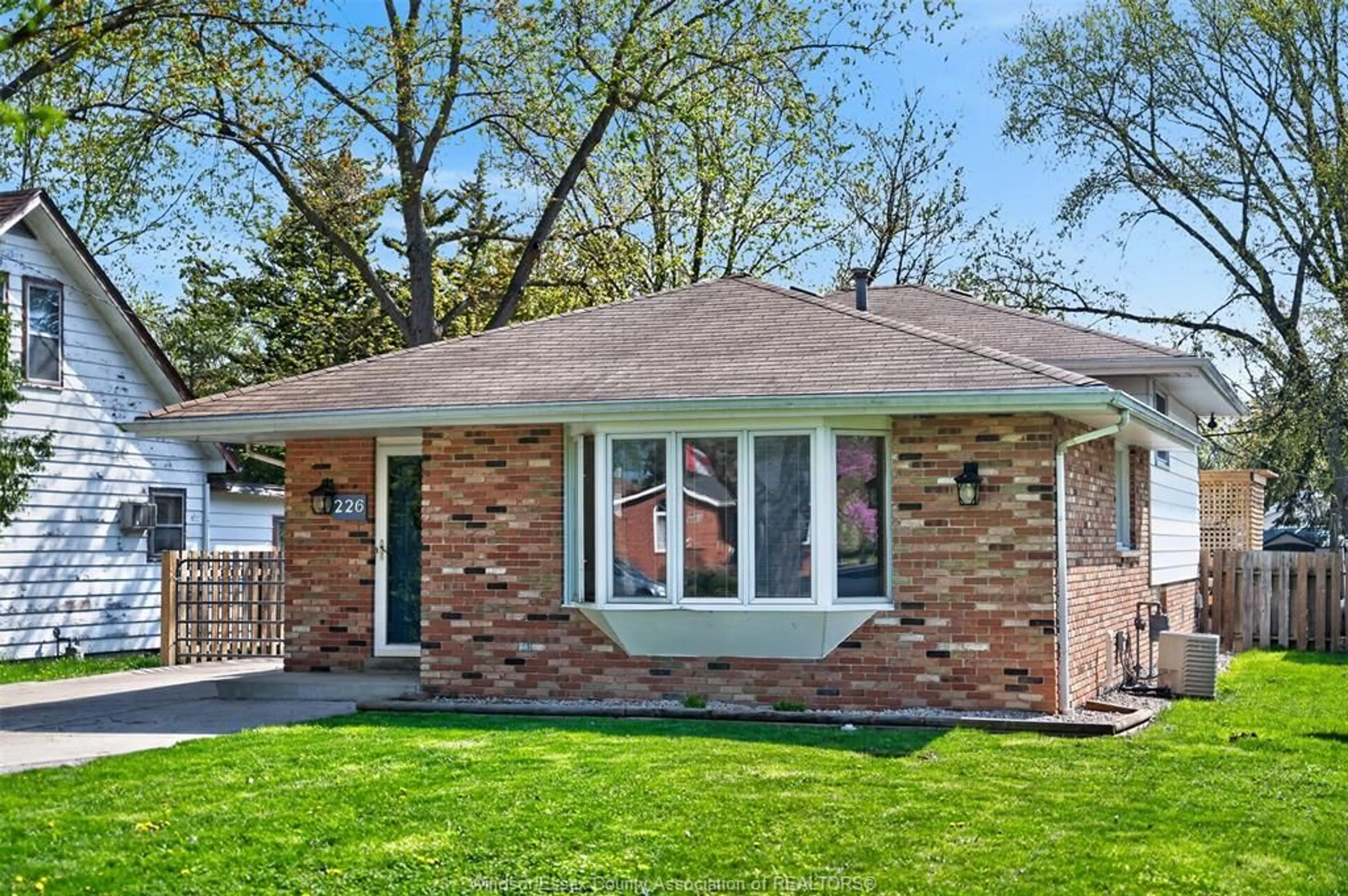 Home with brick exterior material, street for 226 EDGEWATER Blvd, Tecumseh Ontario N8N 2H2