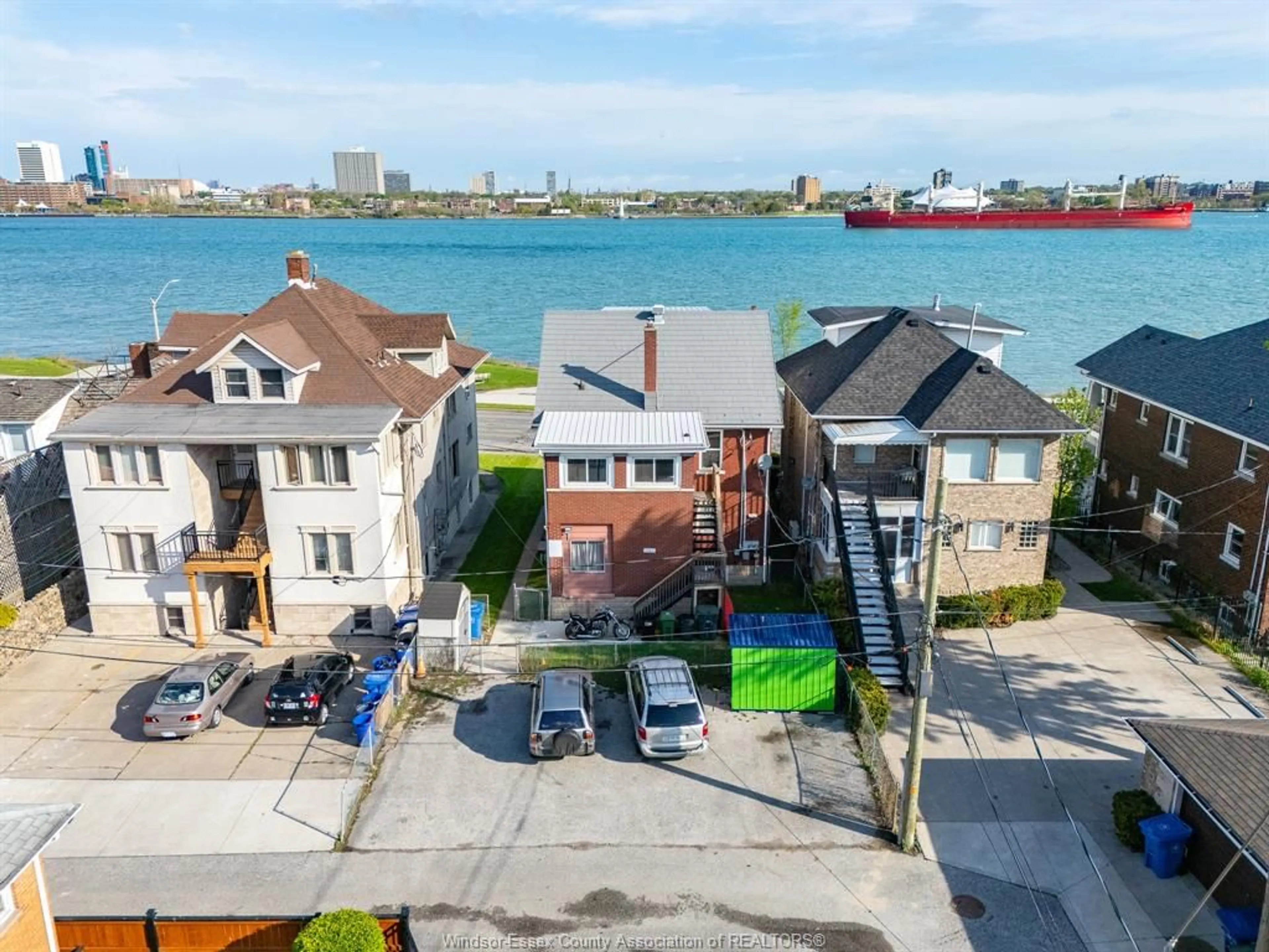 A pic from outside/outdoor area/front of a property/back of a property/a pic from drone, water/lake/river/ocean view for 1441 RIVERSIDE Dr, Windsor Ontario N9A 2T9