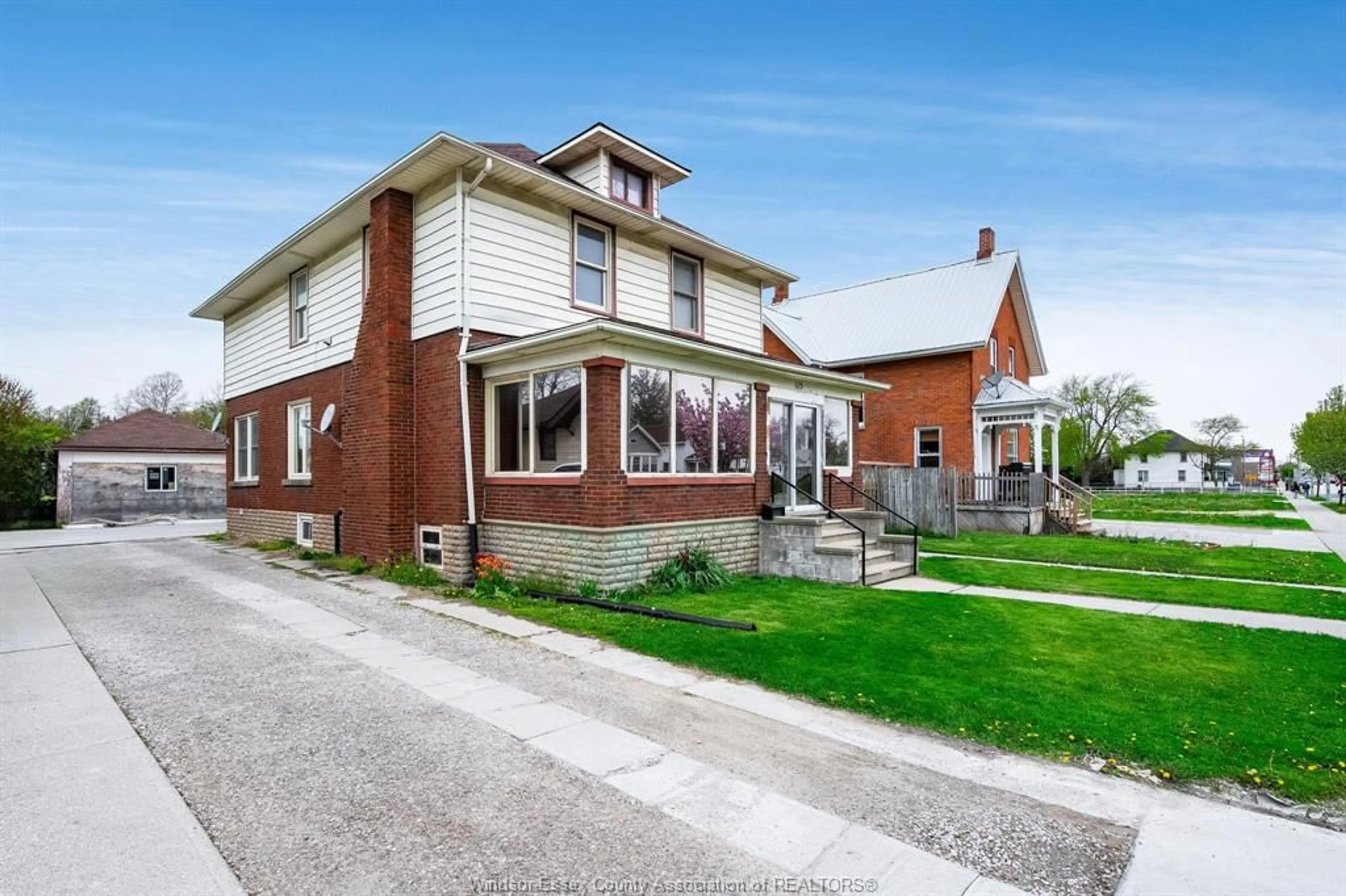 Home with brick exterior material, street for 115 Erie St, Leamington Ontario N8H 3B5