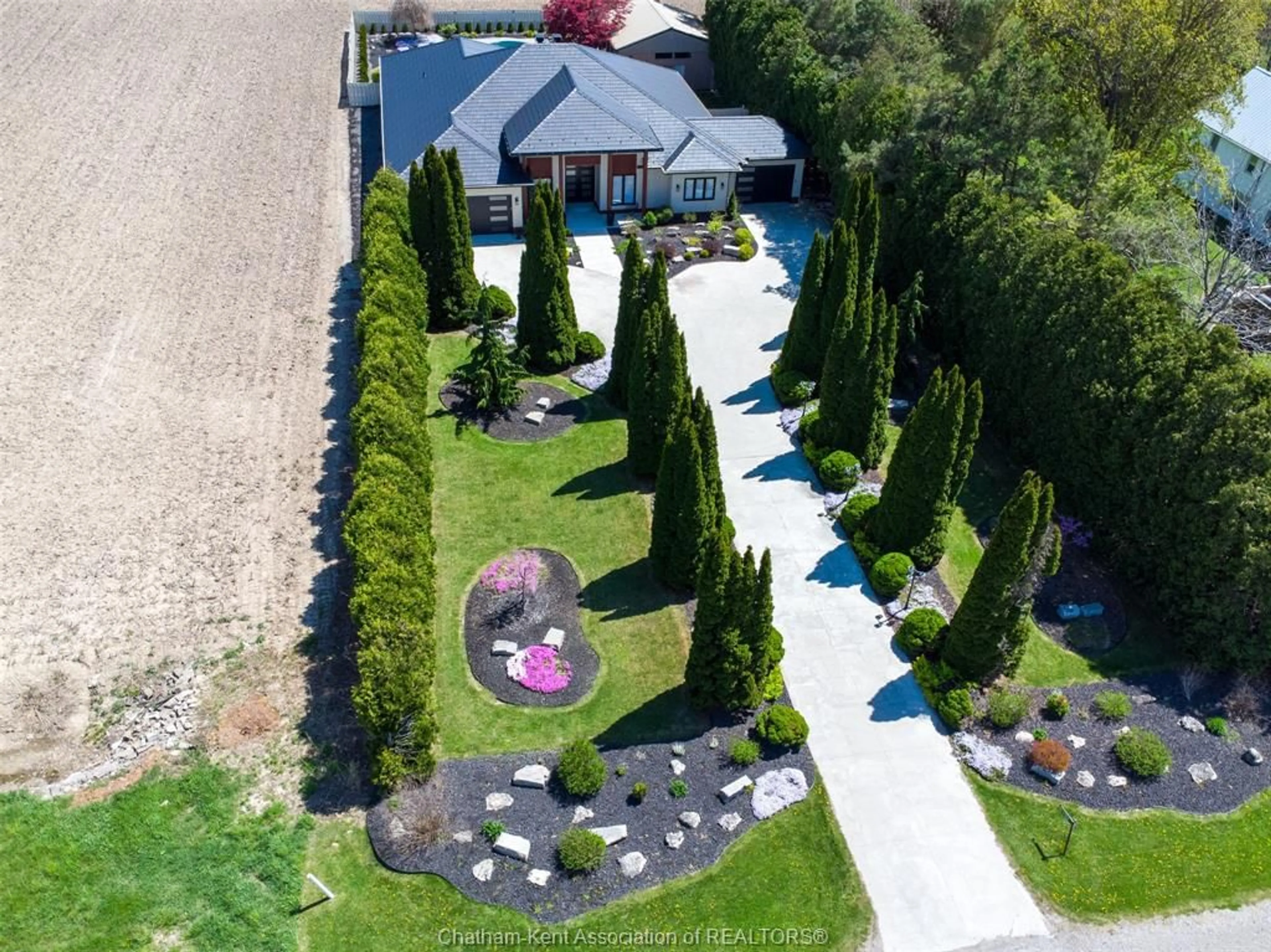 A pic from outside/outdoor area/front of a property/back of a property/a pic from drone, street for 7196 Pain Court Line, Pain Court Ontario N0P 1Z0