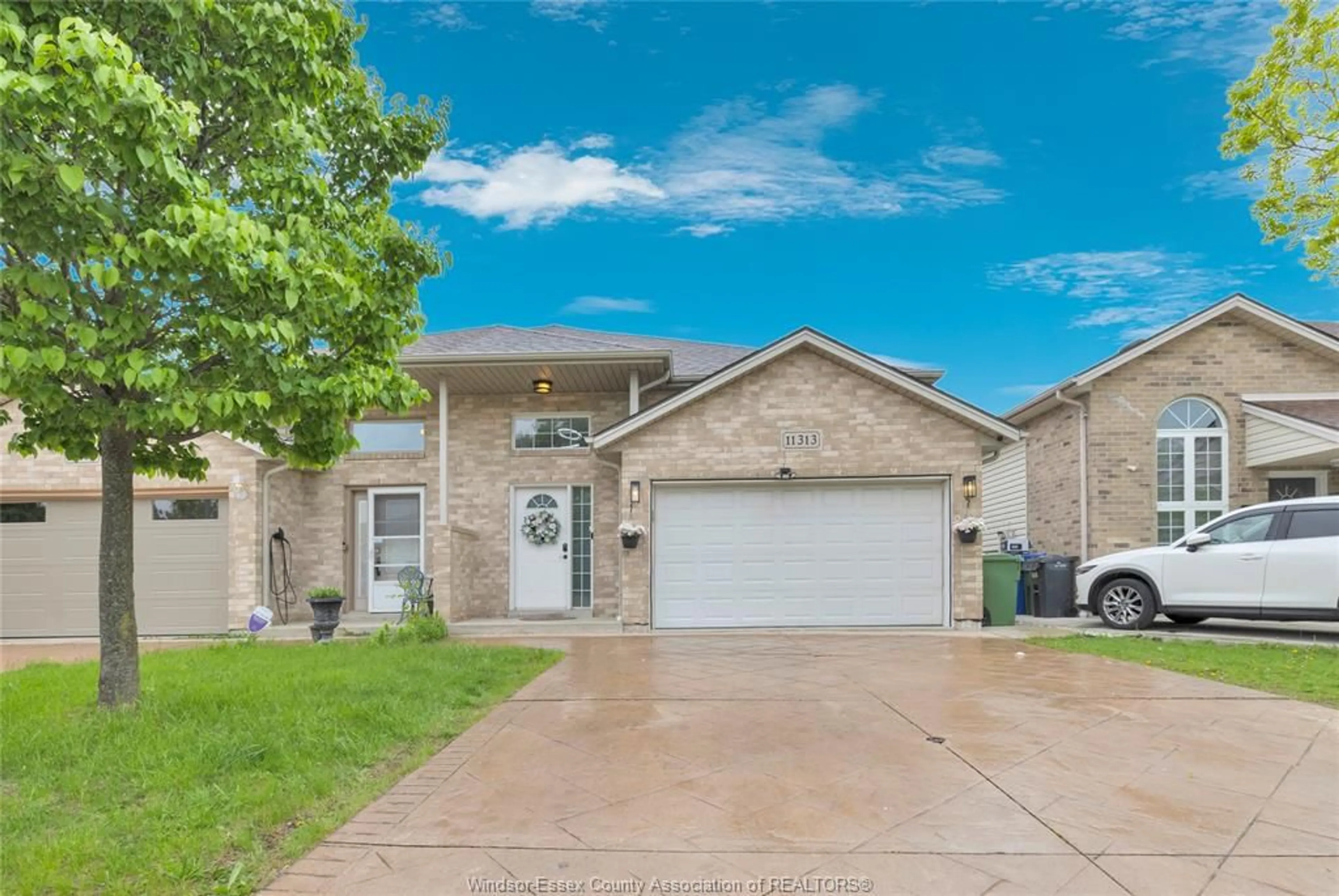 Home with brick exterior material, street for 11313 TIMBER BAY, Windsor Ontario N8R 2L2